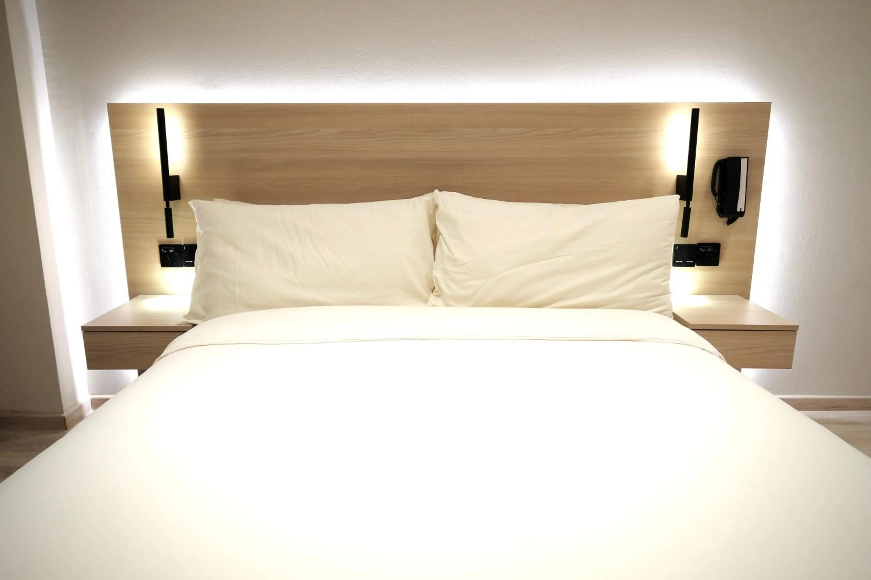 Bed in Rest Bugis Hotel