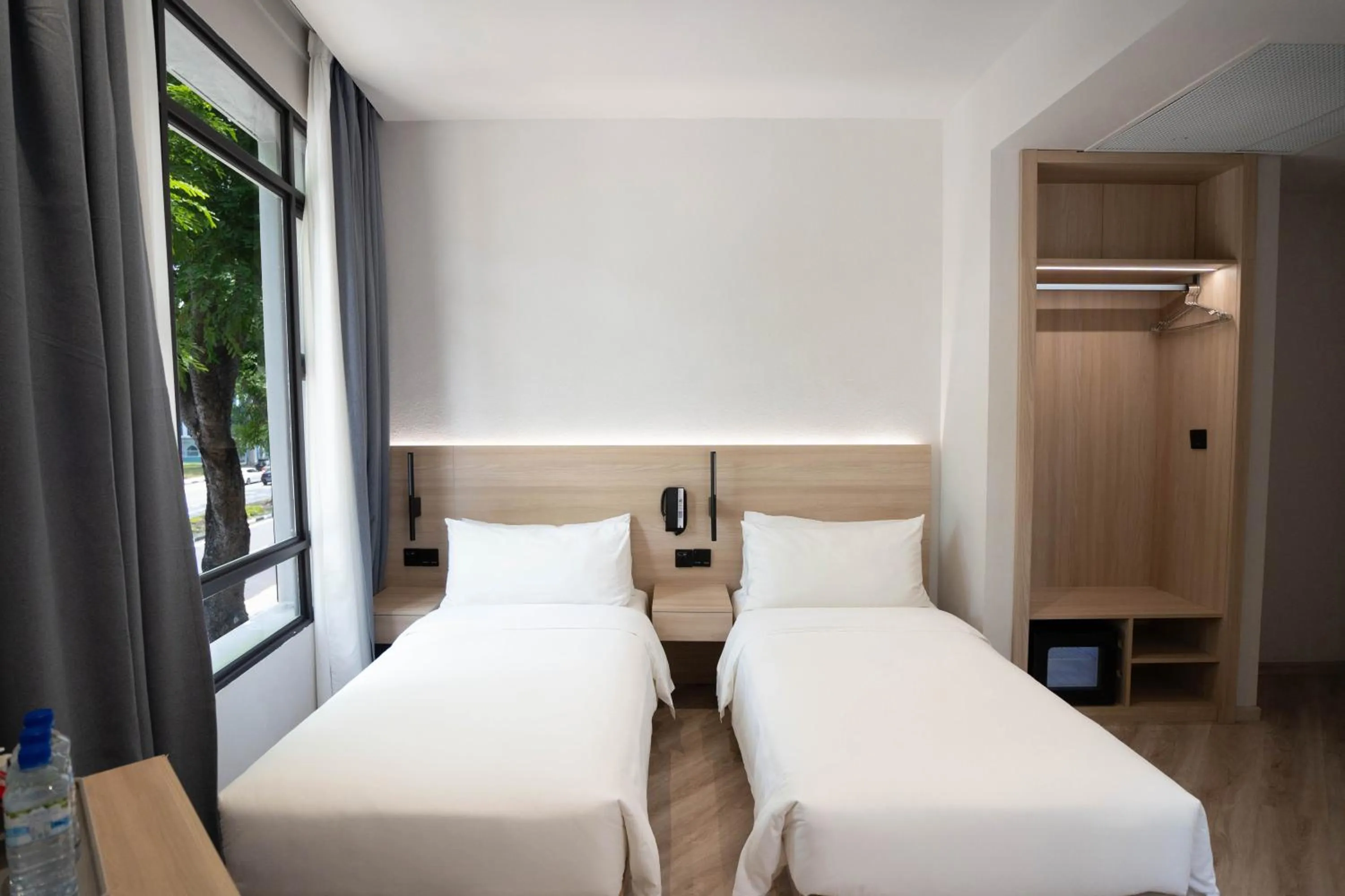 Bed in Rest Bugis Hotel