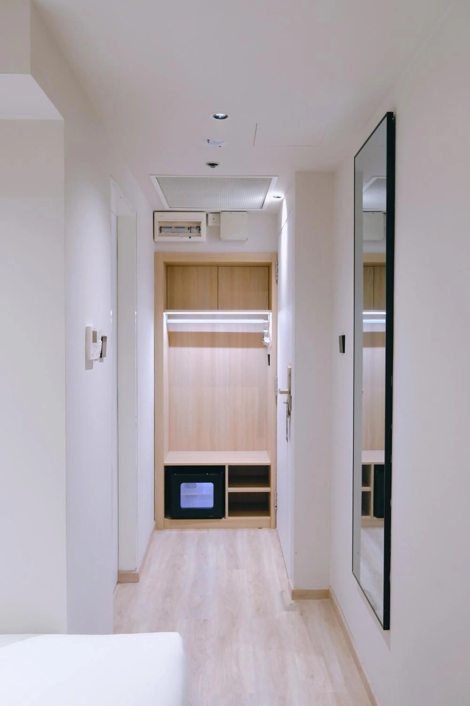 wardrobe, Bed in Rest Bugis Hotel