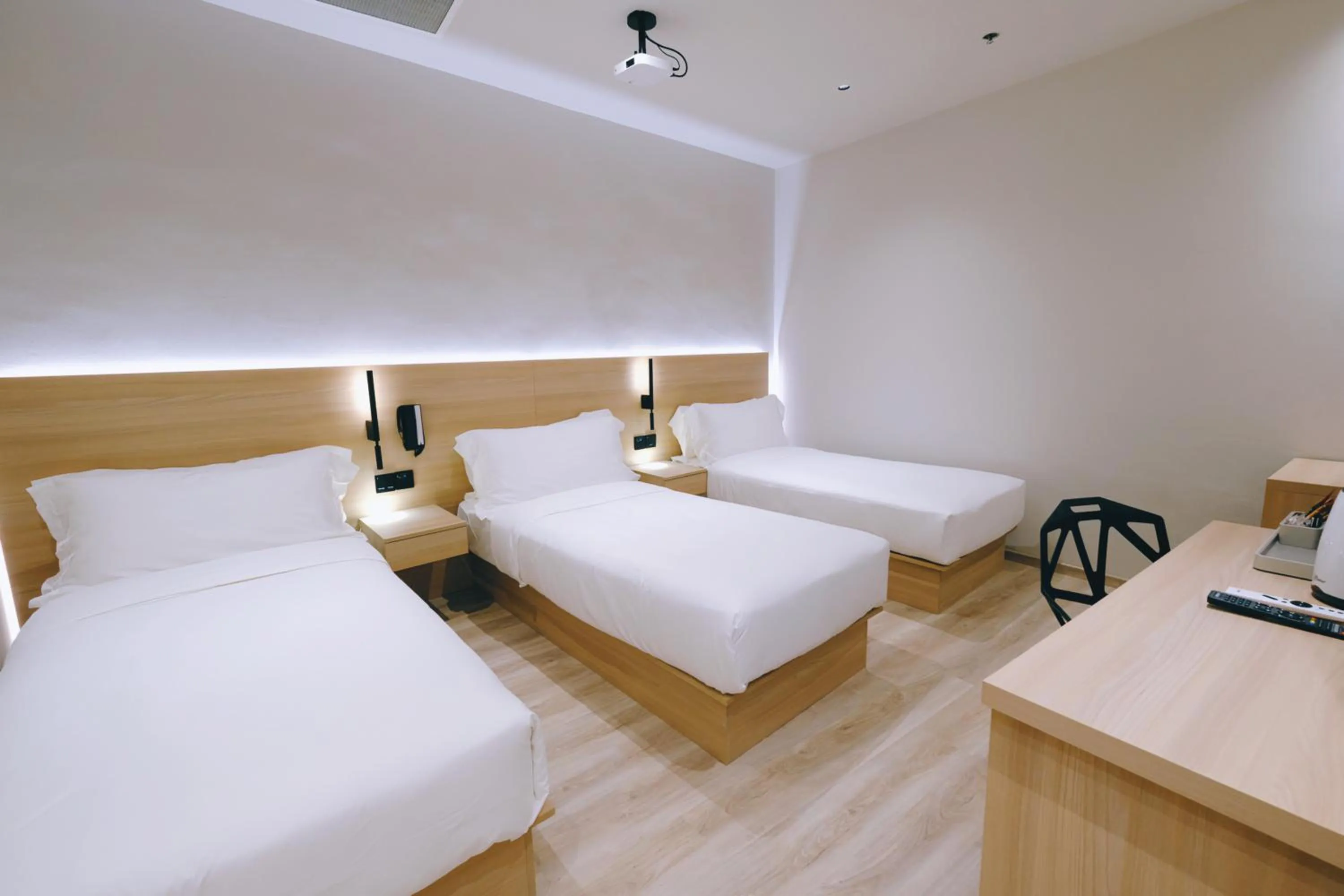 Bed in Rest Bugis Hotel