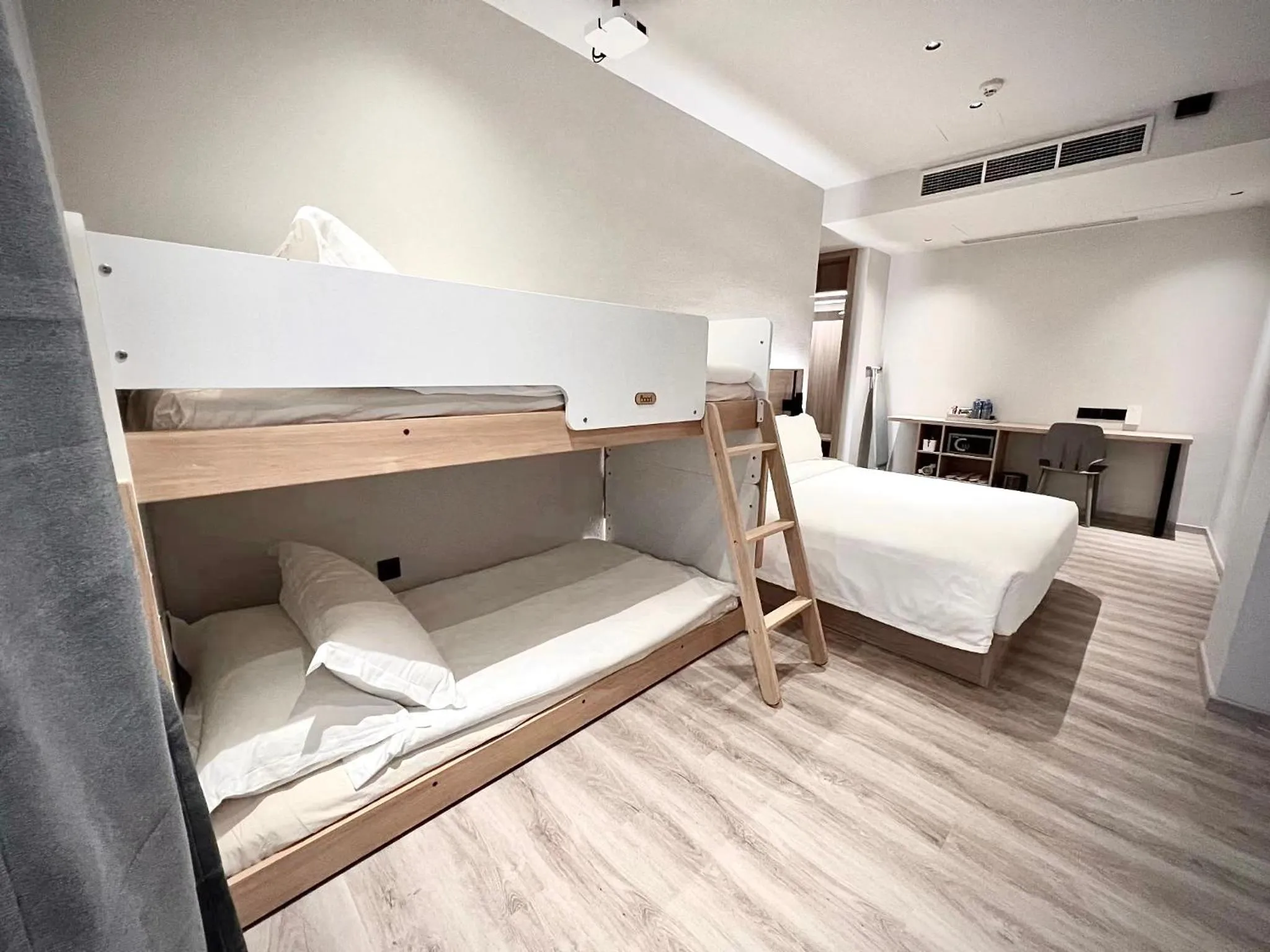 Bed in Rest Bugis Hotel