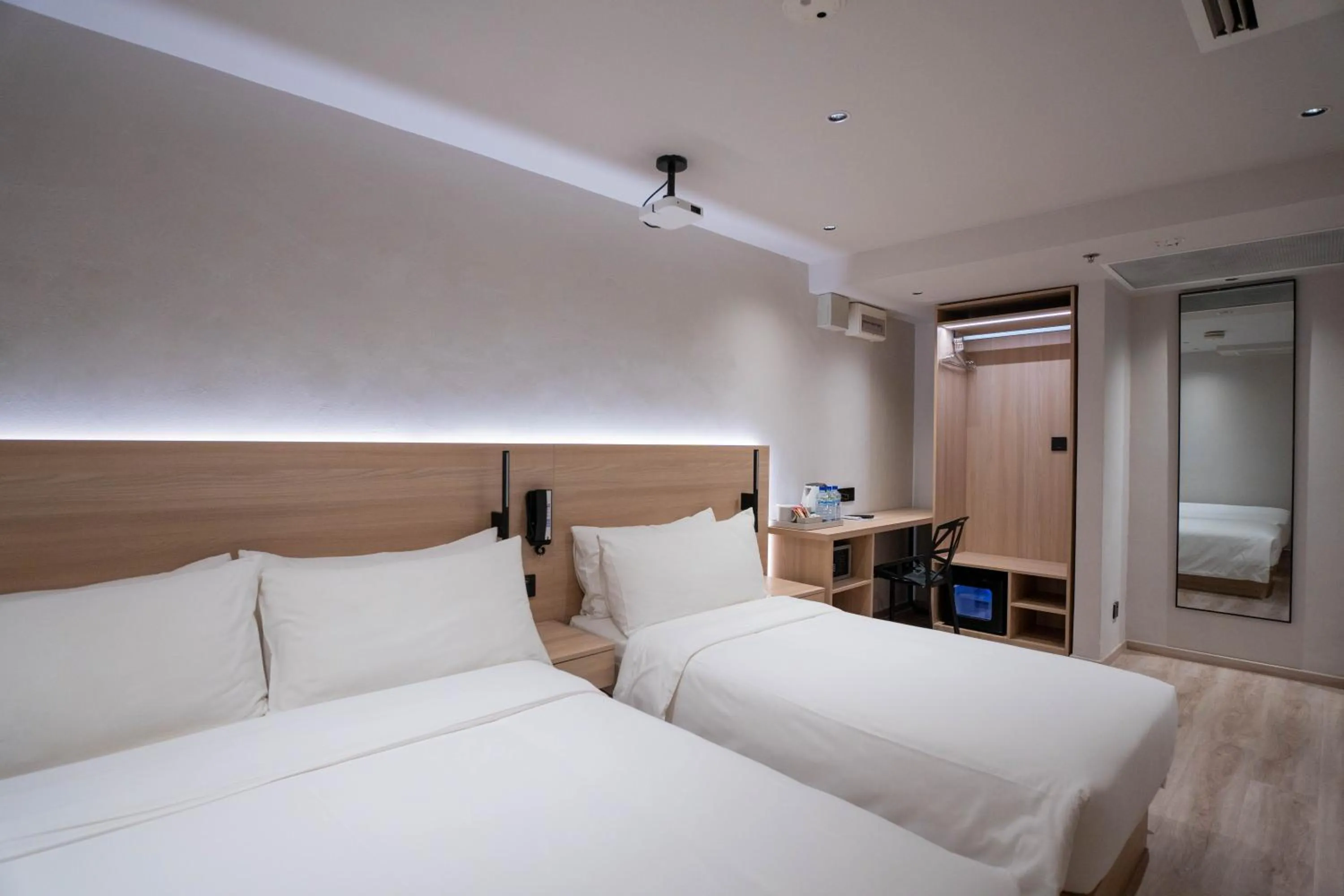 Bed in Rest Bugis Hotel