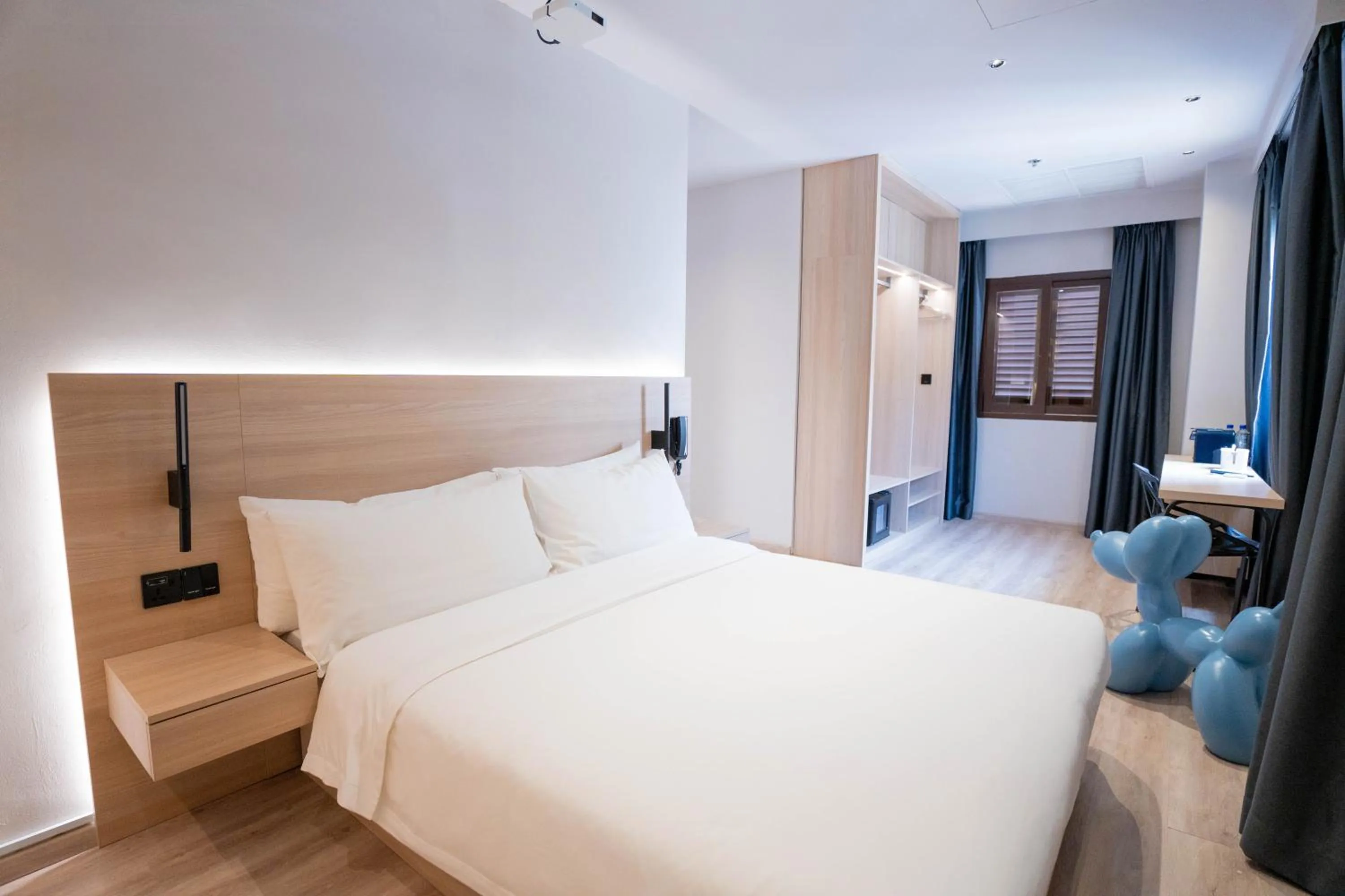 Bed in Rest Bugis Hotel