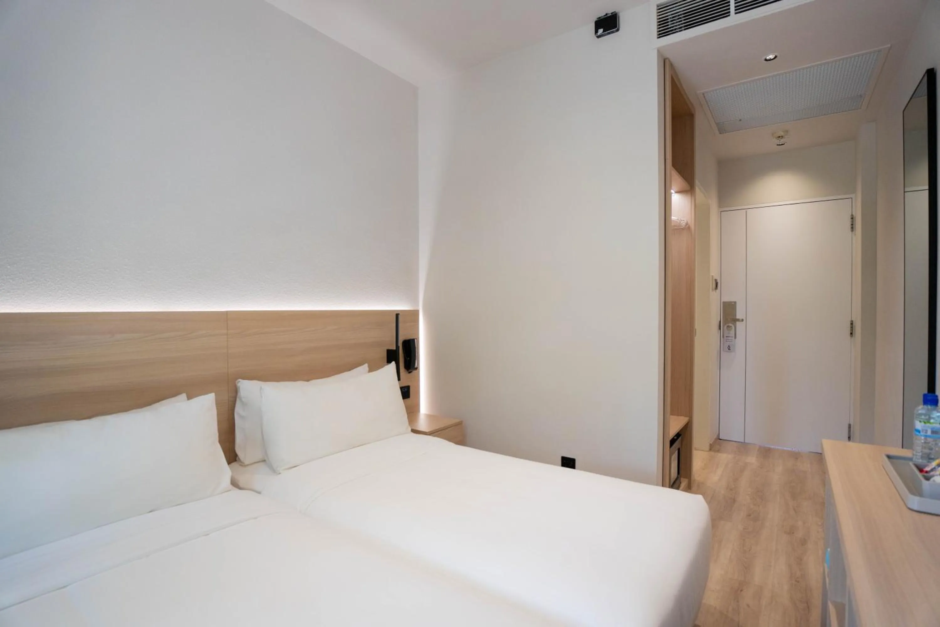 Bed in Rest Bugis Hotel