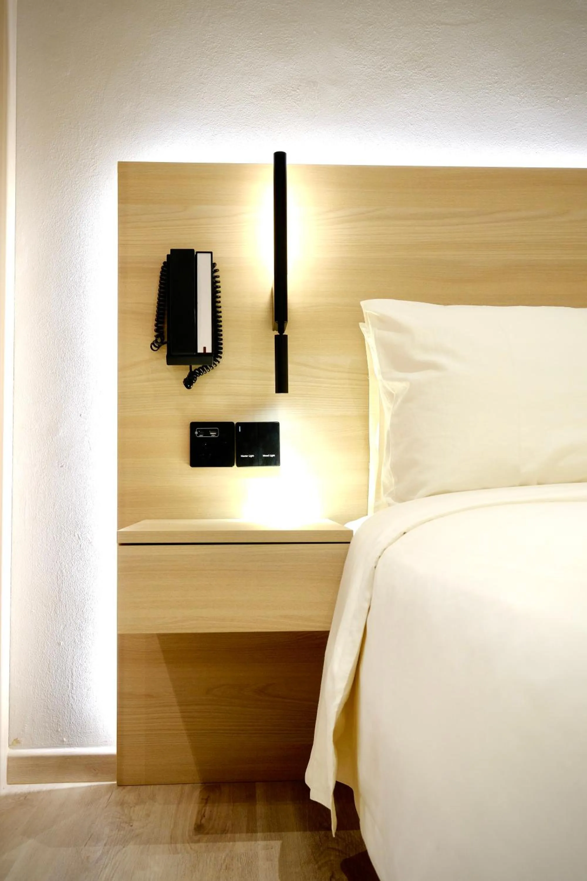 Bed in Rest Bugis Hotel