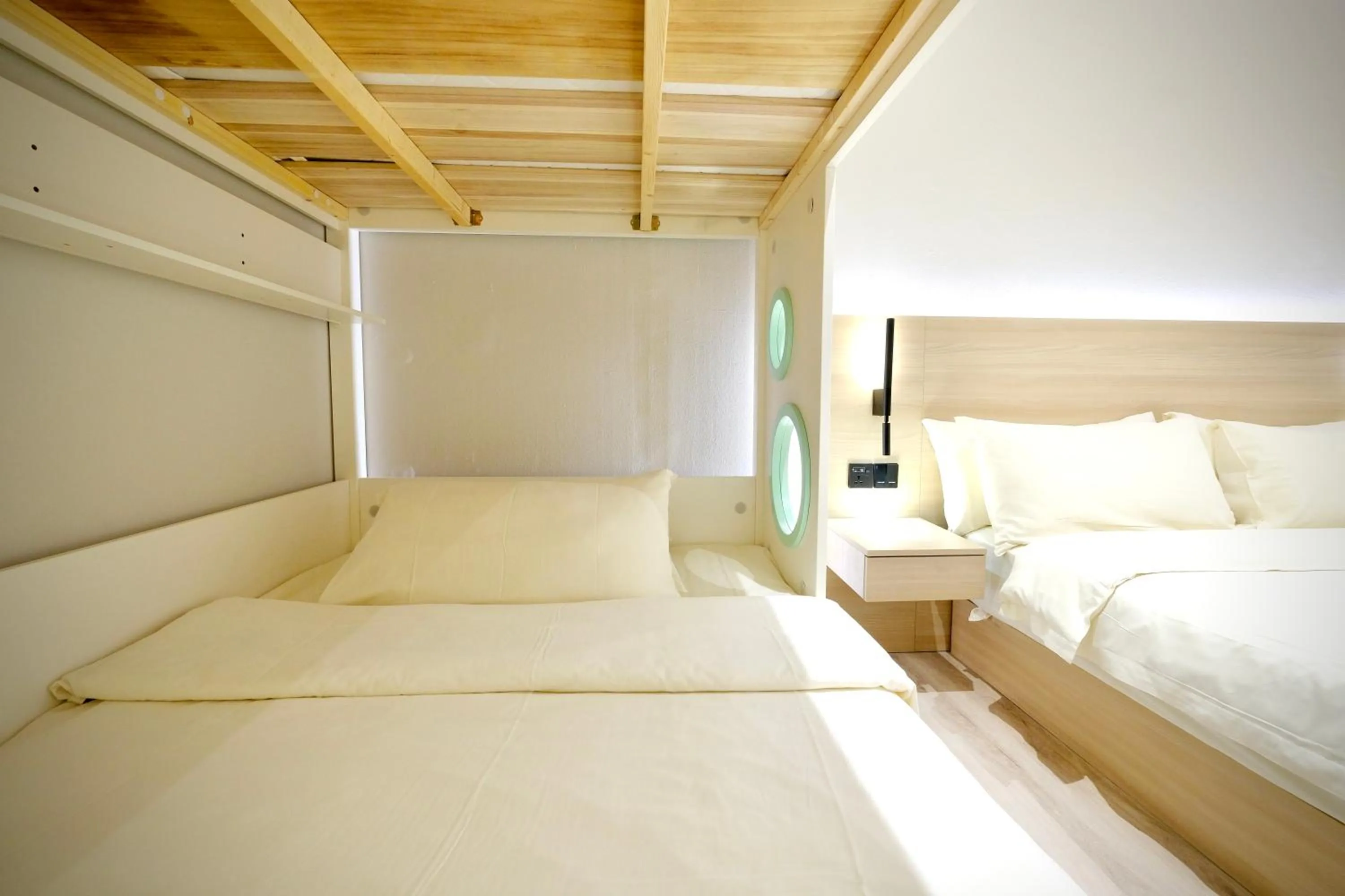 Bed in Rest Bugis Hotel