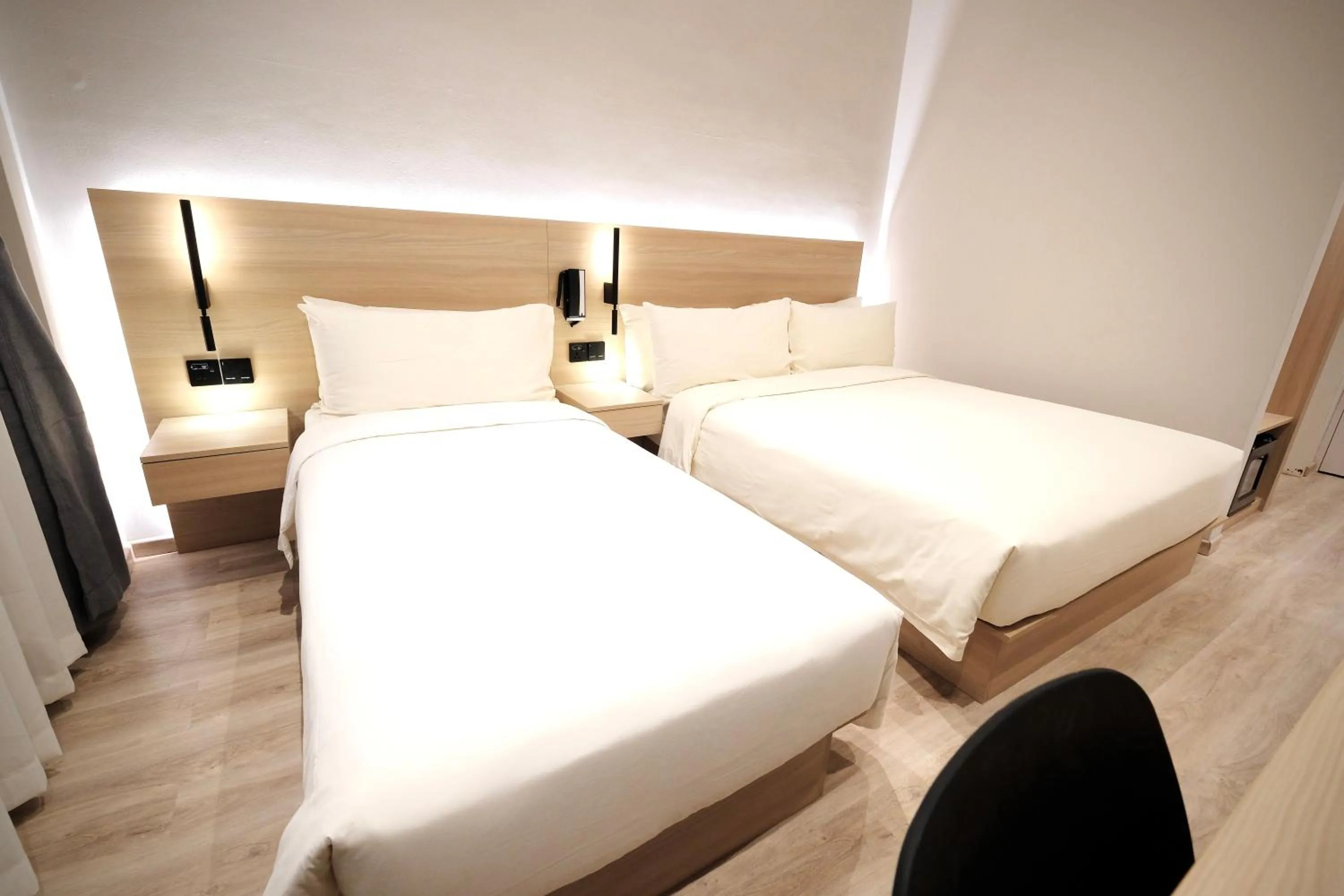 Bed in Rest Bugis Hotel