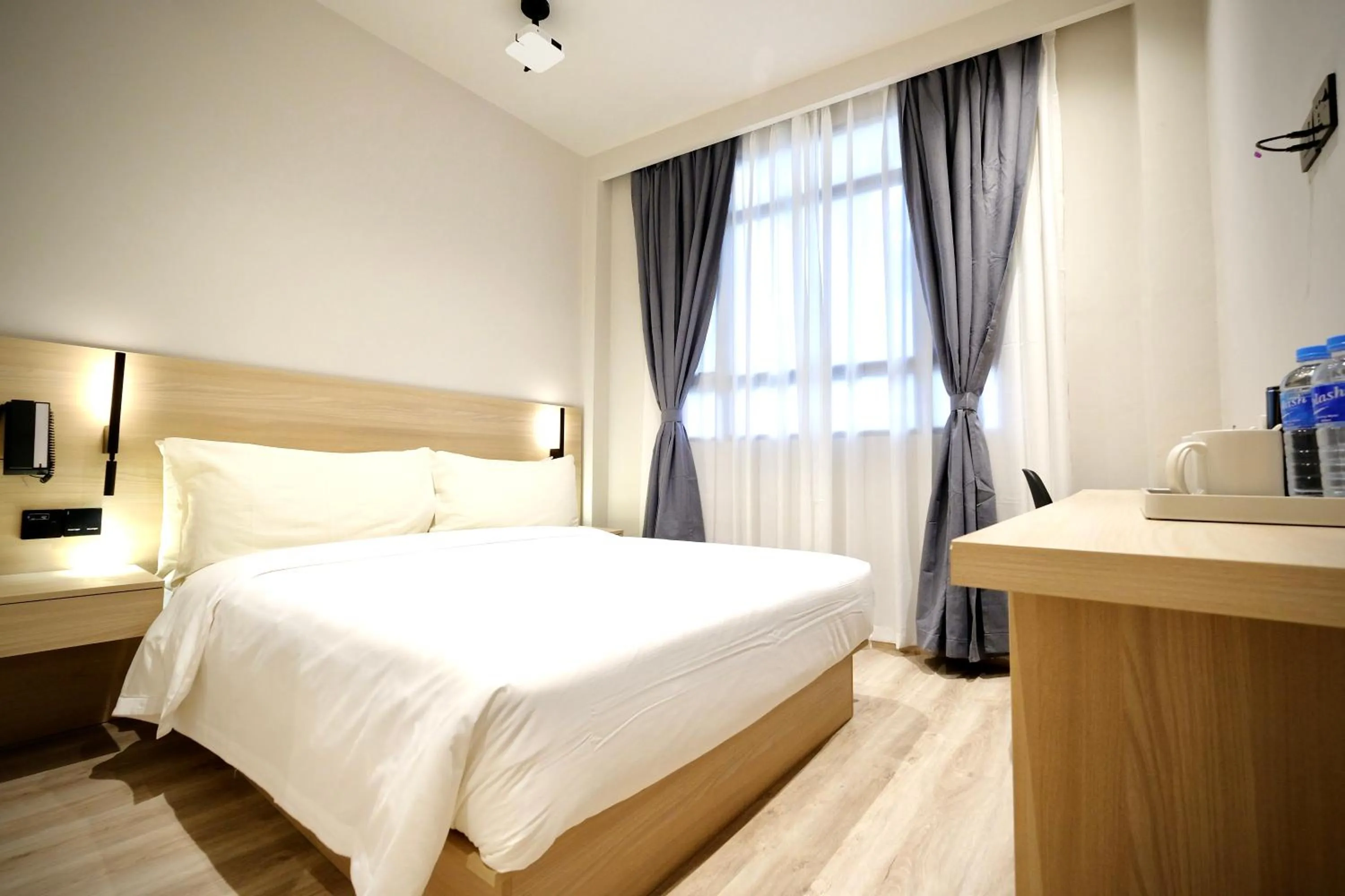 Photo of the whole room, Bed in Rest Bugis Hotel