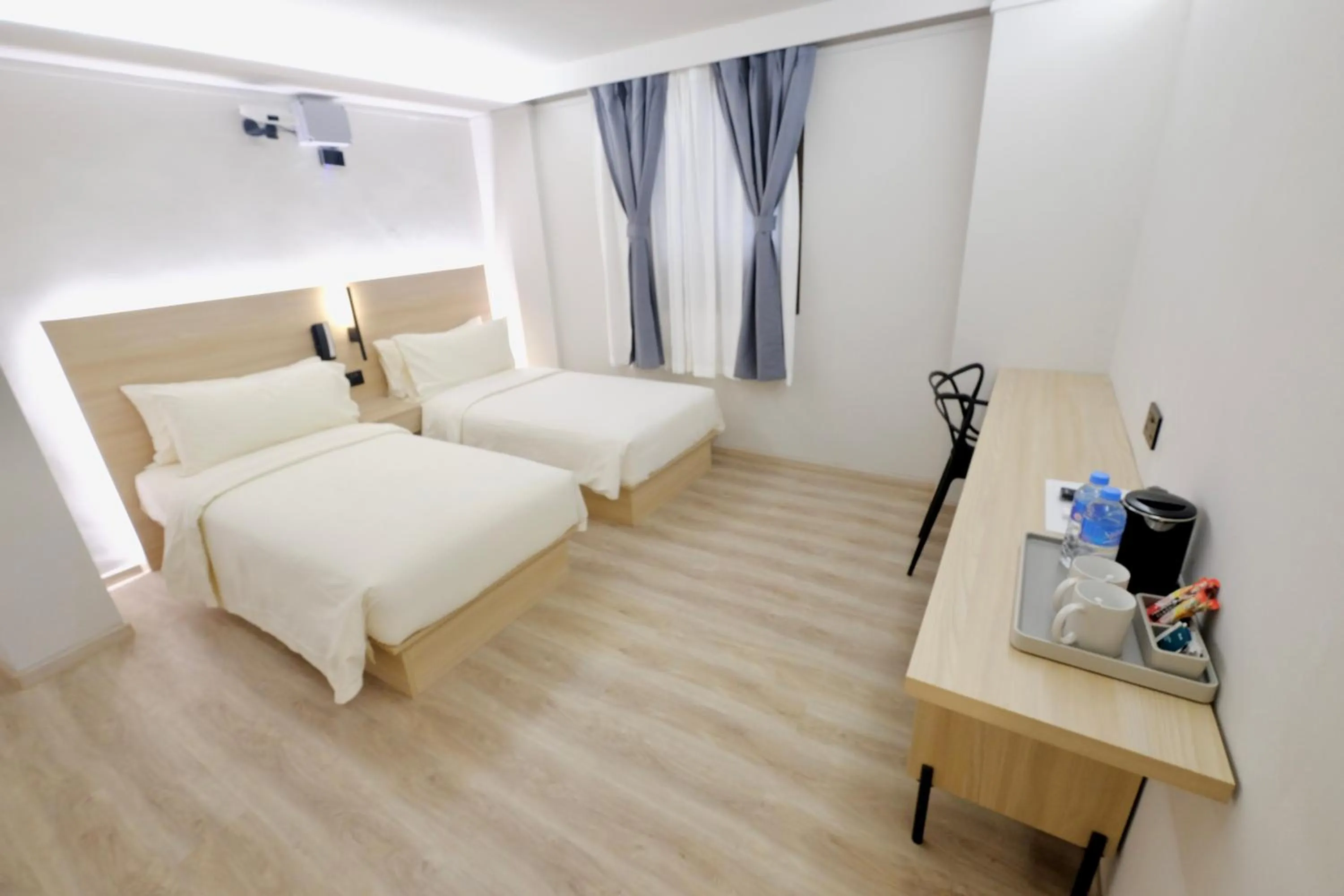 Bed in Rest Bugis Hotel