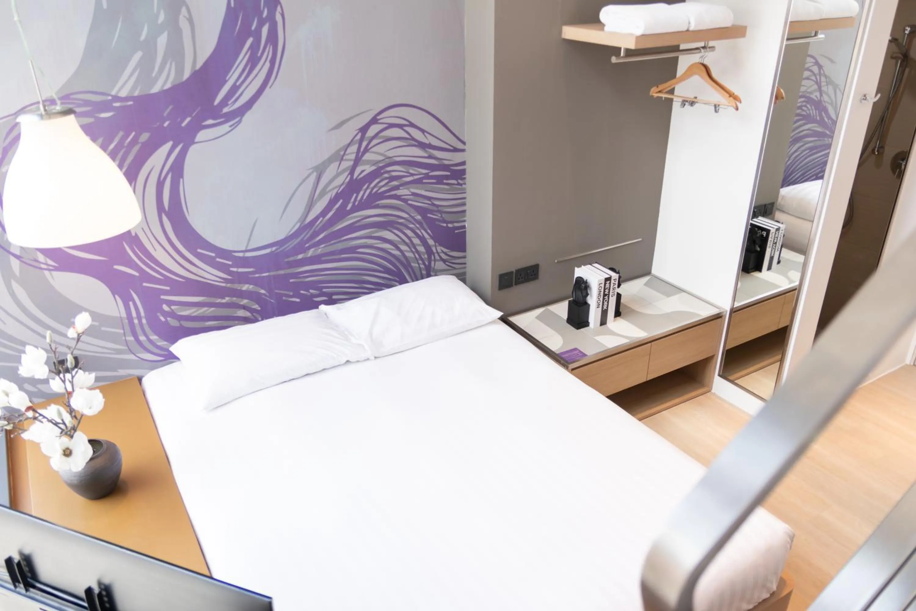 Bed in Studio M Hotel