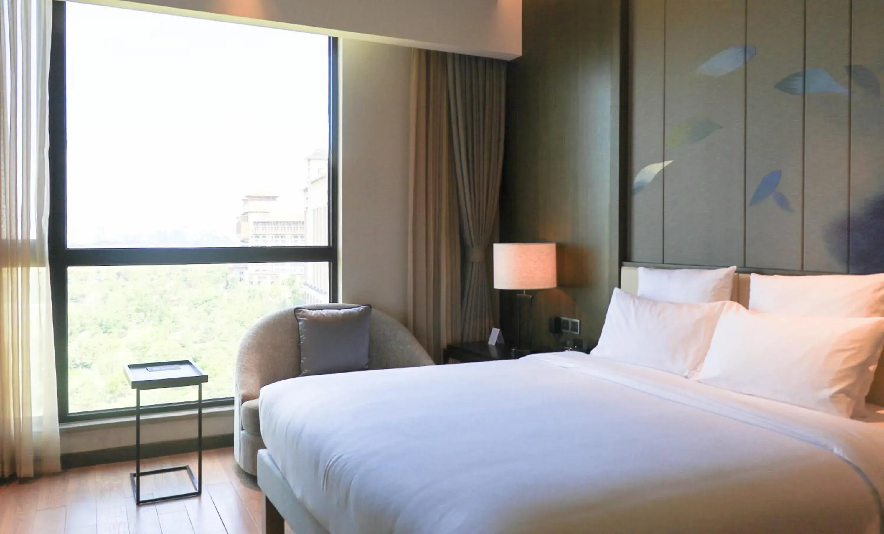 Deluxe King Suite with Lake View in Pullman Nanchang Sunac Deluxe King Suite with Lake View in Pullman Nanchang Sunac