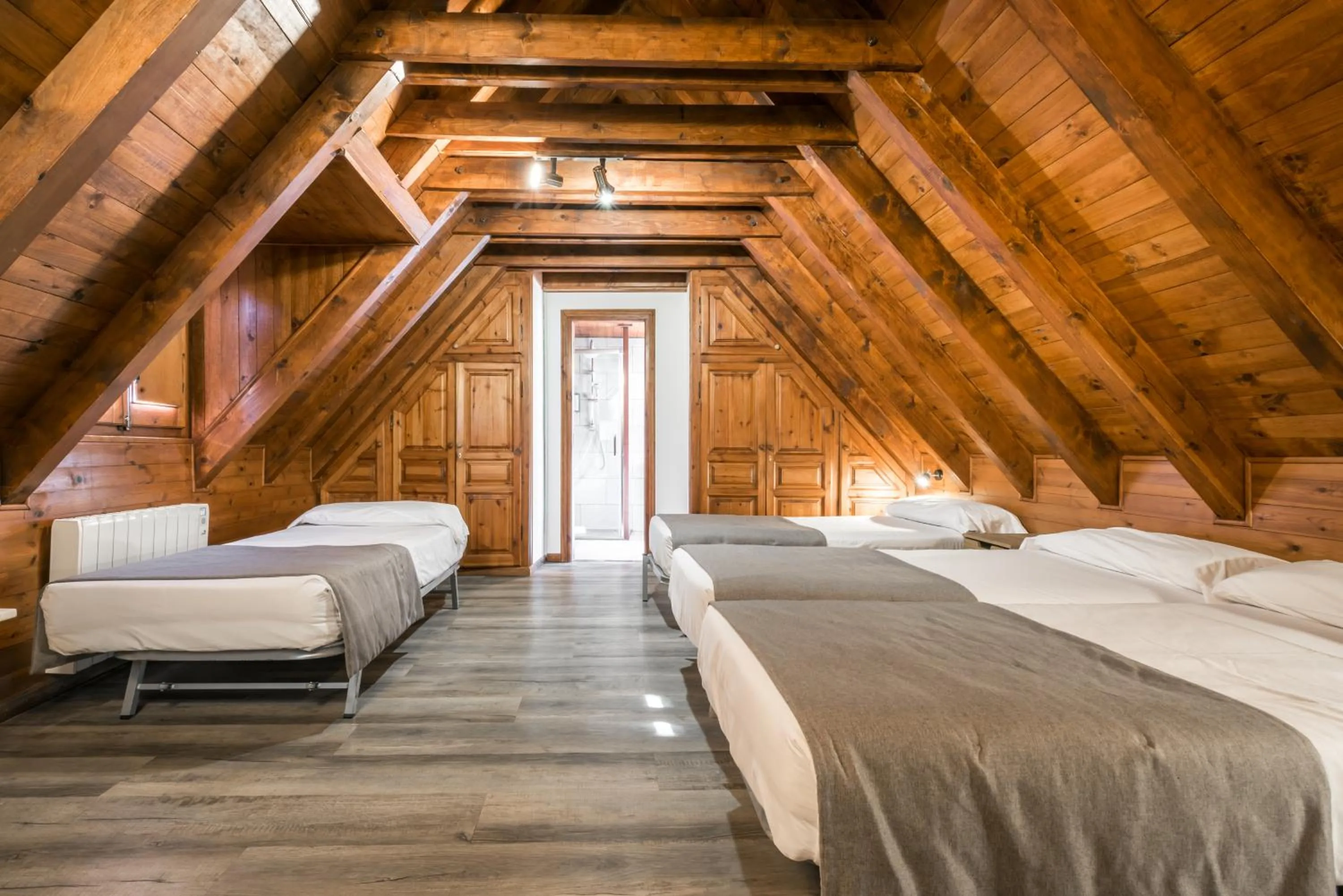 Quadruple Room in Hotel SNÖ Mont Romies