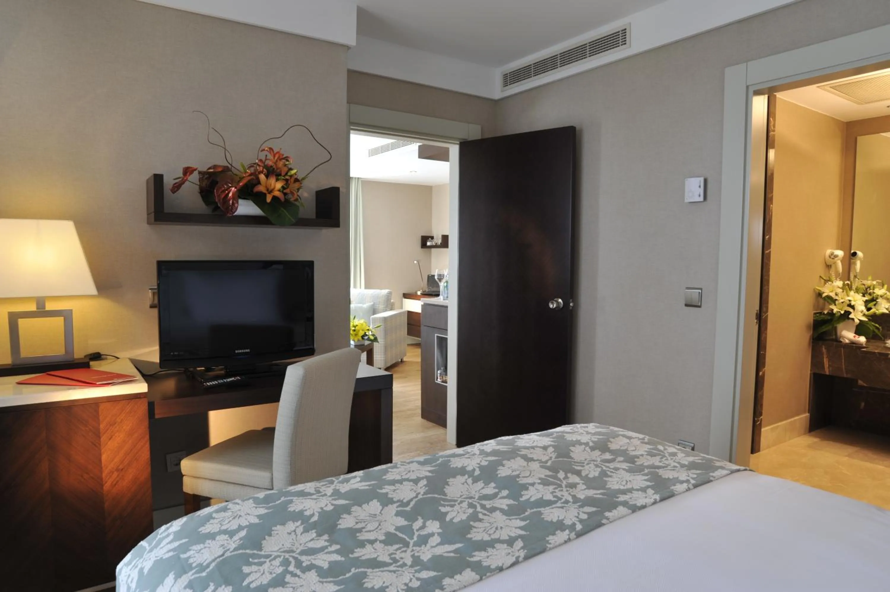 Seating area, Bed in Ramada Plaza Antalya