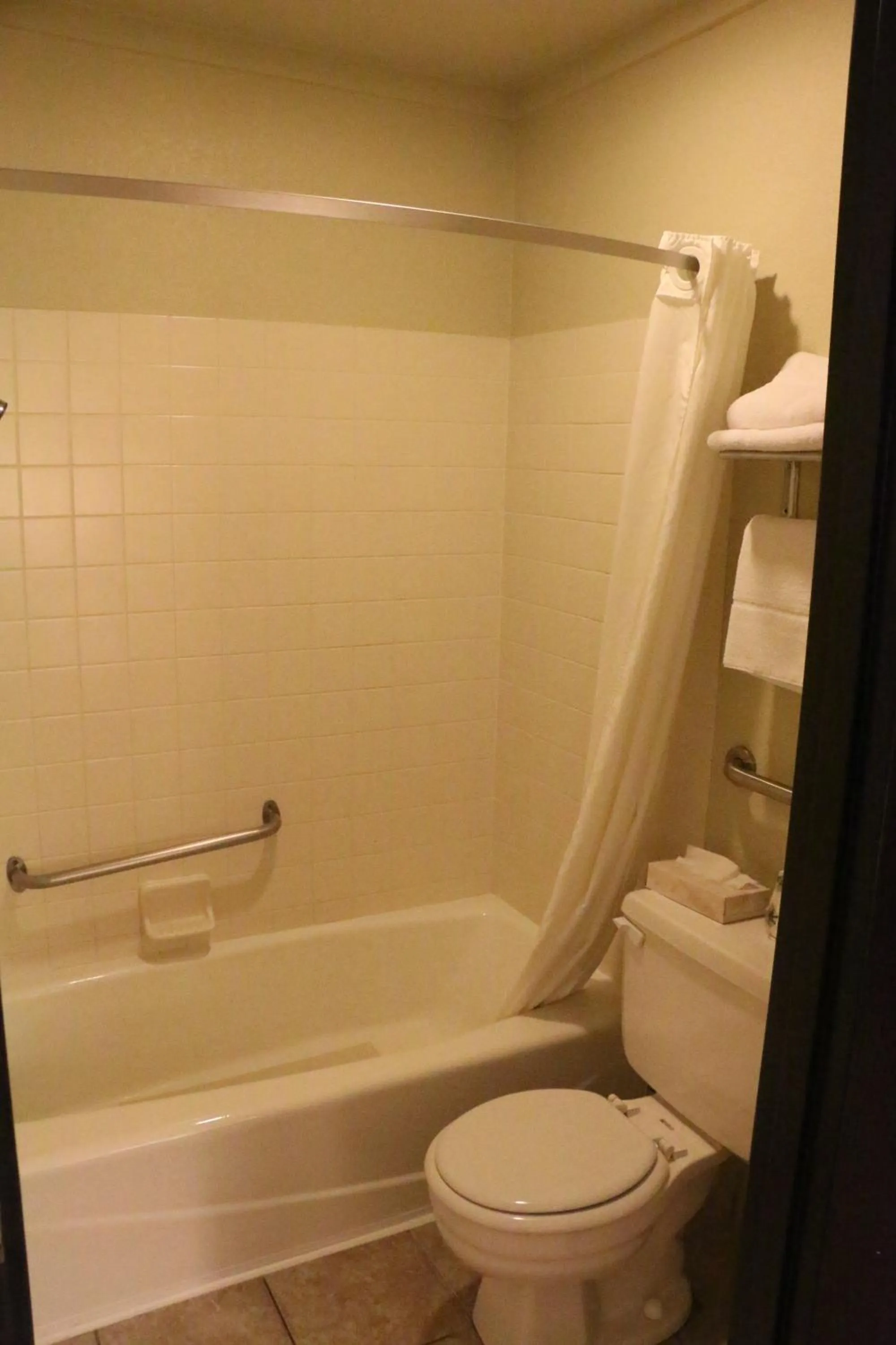 Toilet in Super 8 by Wyndham Windsor/Madison North