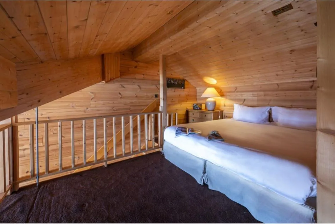 Bed in Hôtel Au Chamois d'Or by Les Etincelles