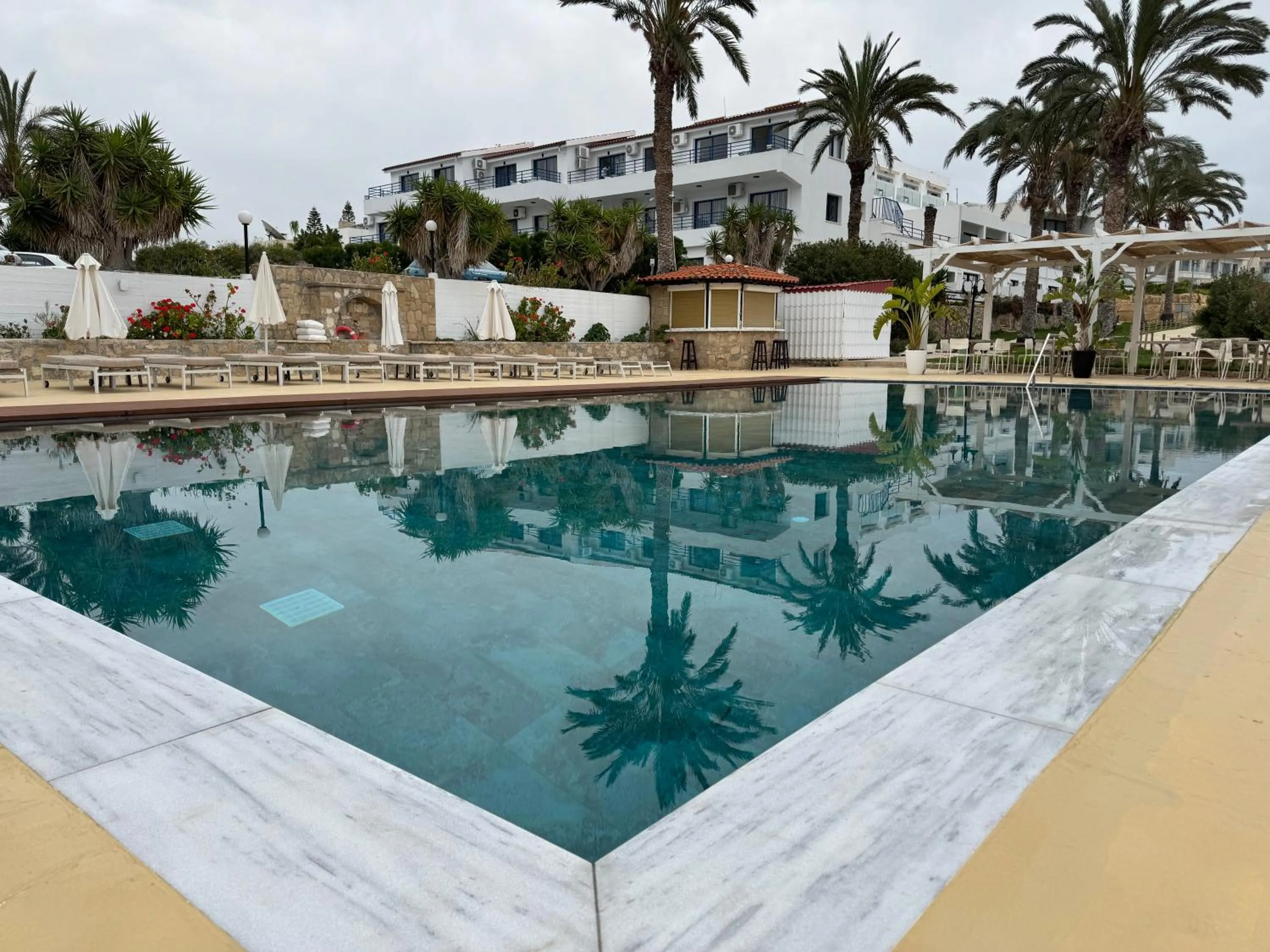 Swimming pool in Vrachia Beach Hotel & Suites - Adults Only