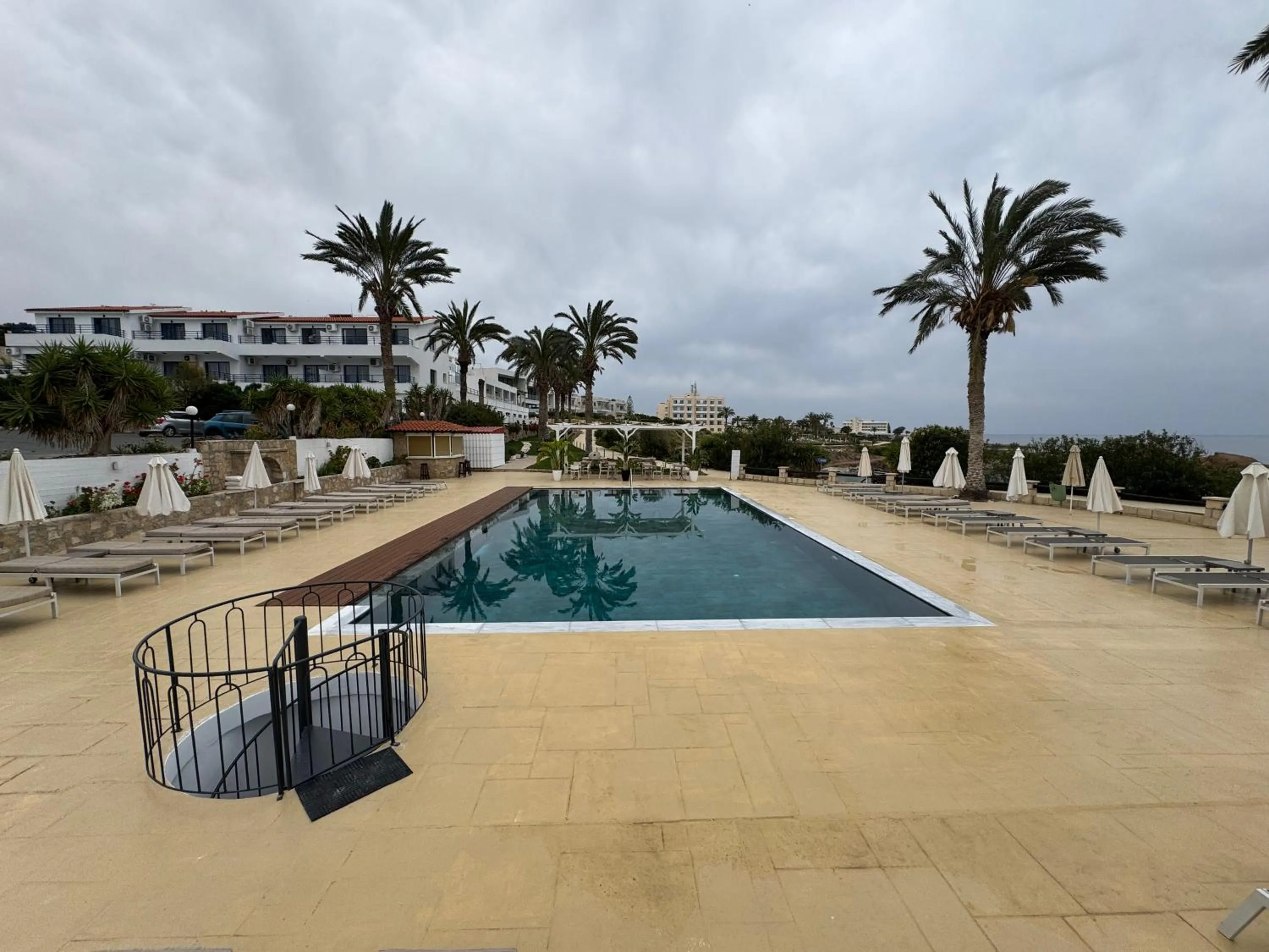 Swimming pool in Vrachia Beach Hotel & Suites - Adults Only