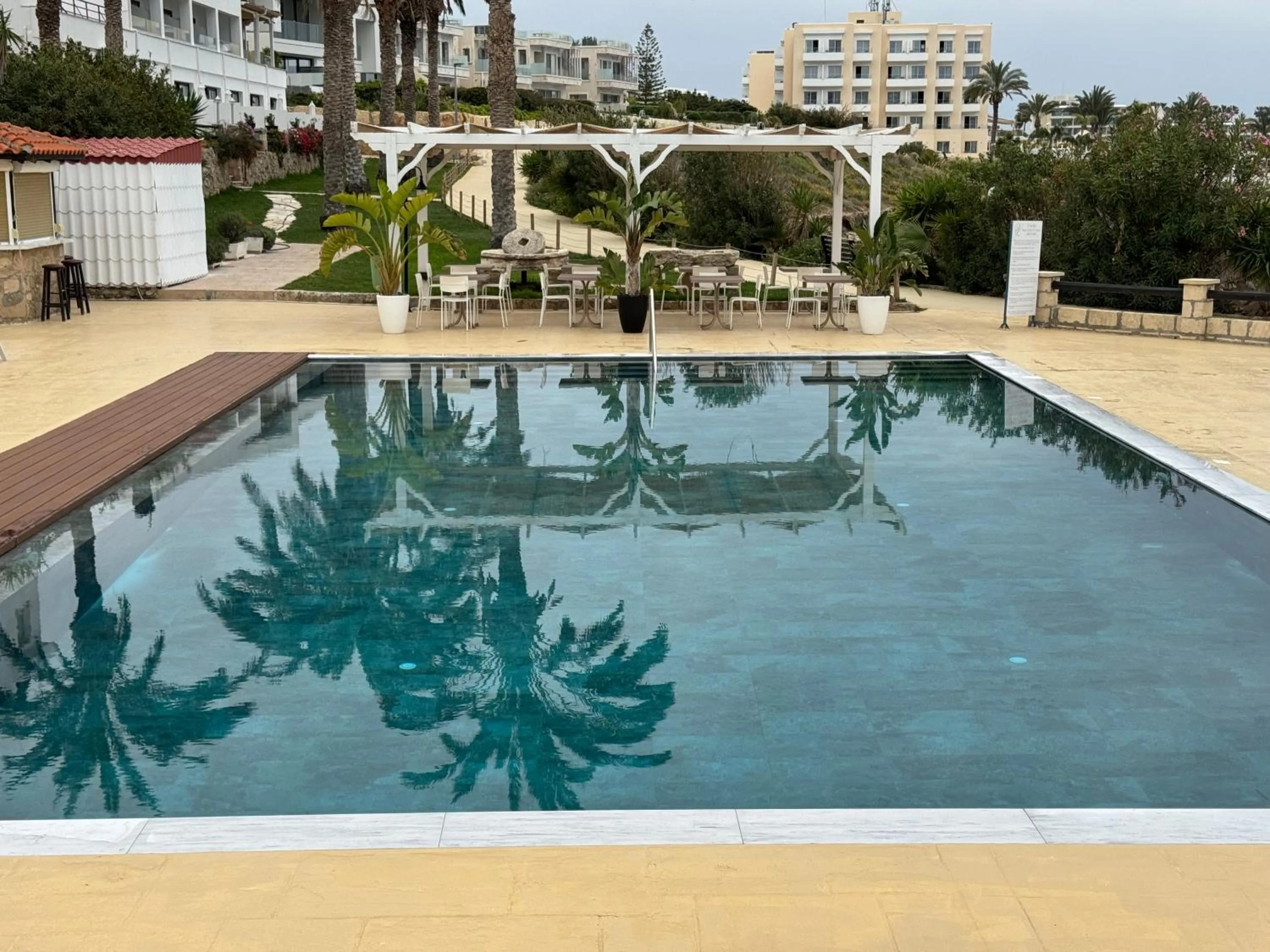 Swimming pool in Vrachia Beach Hotel & Suites - Adults Only
