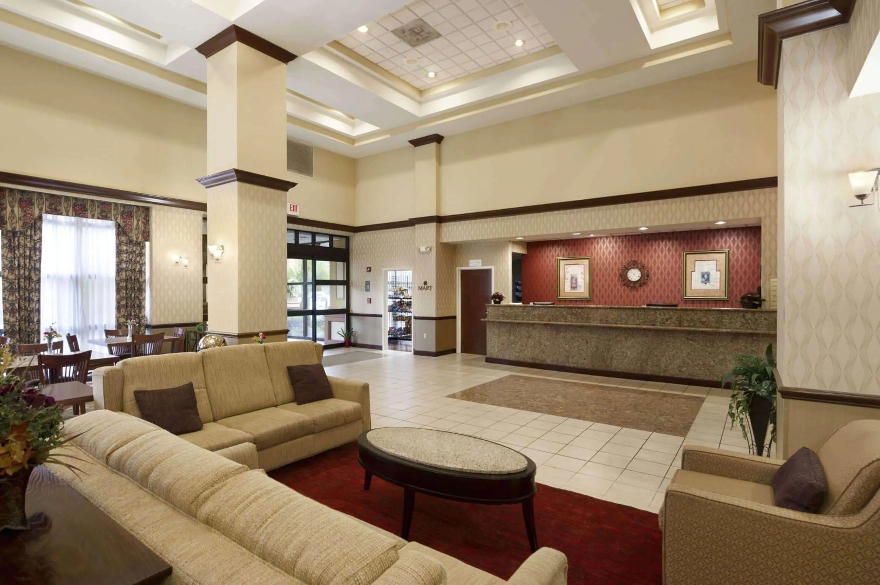 Lobby or reception in Ramada by Wyndham Suites Orlando Airport- Free Airport Shuttle