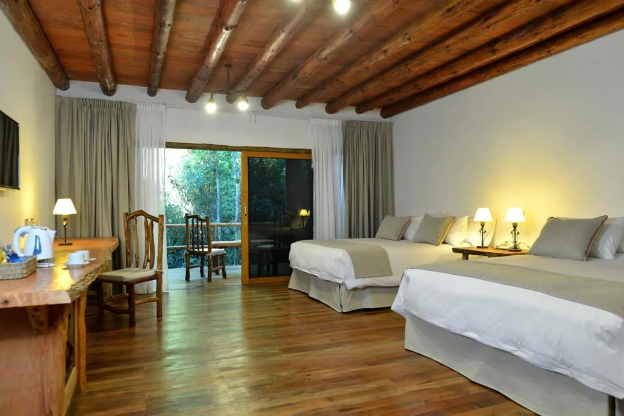 Photo of the whole room, Bed in La Aldea De La Selva Lodge