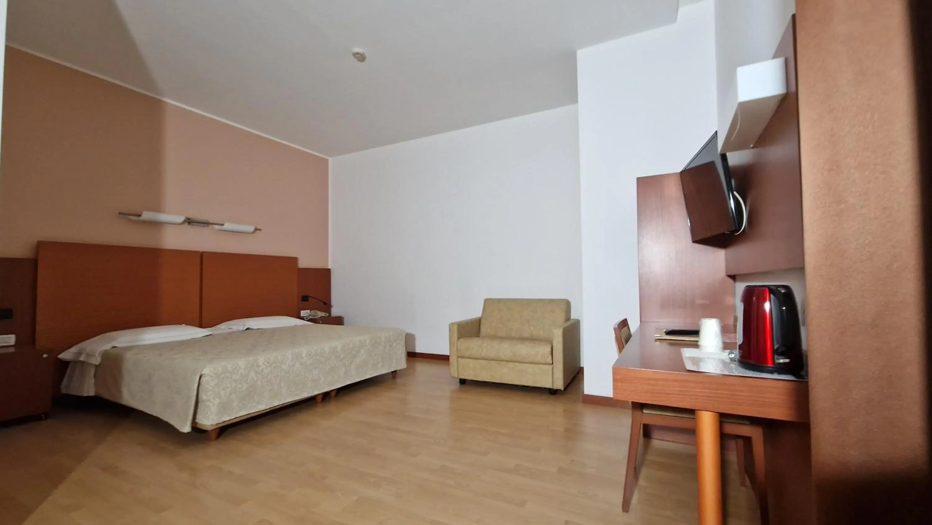 Bed in Bella Italia Palace Hotel