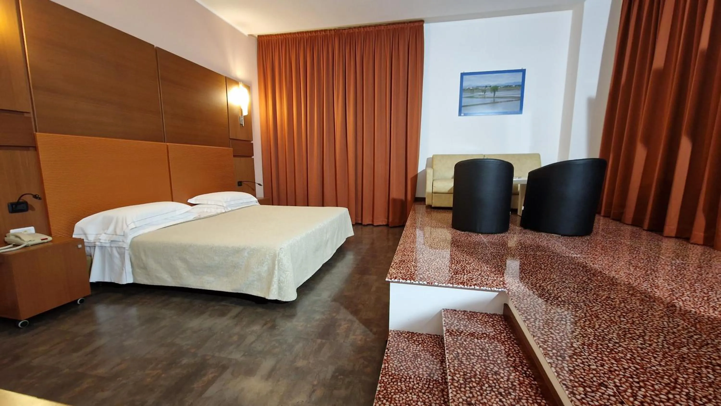 Bed in Bella Italia Palace Hotel