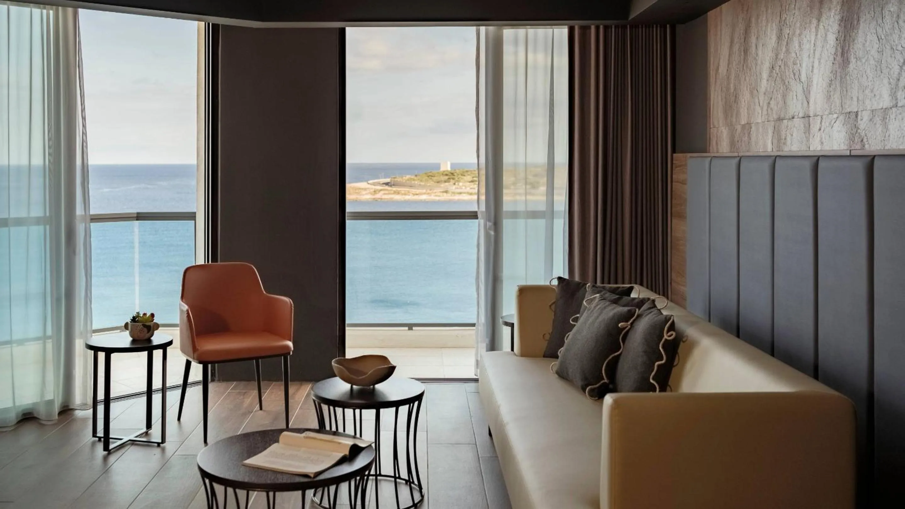 Seating area in AX ODYCY Hotel