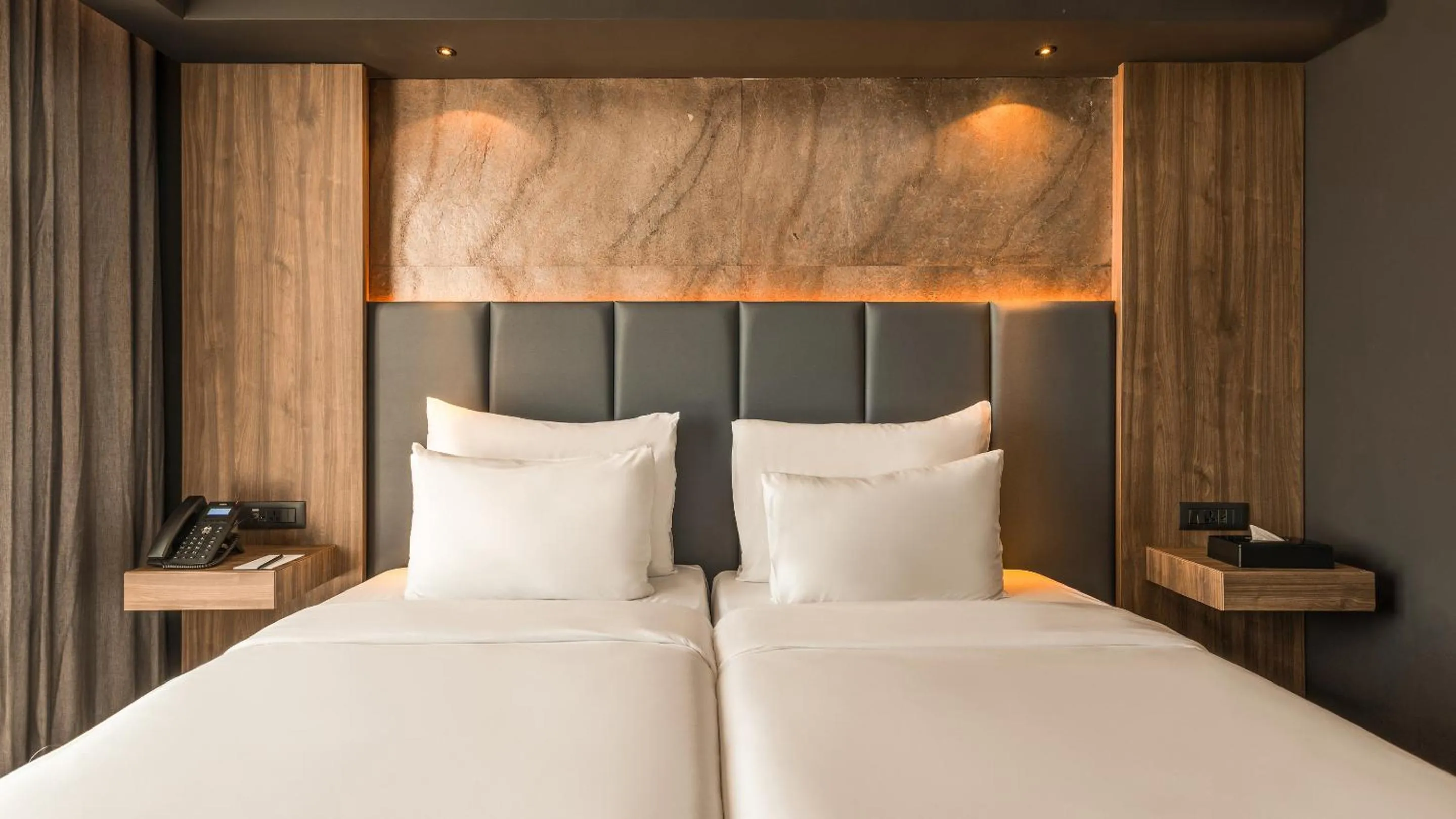 Bed in AX ODYCY Hotel