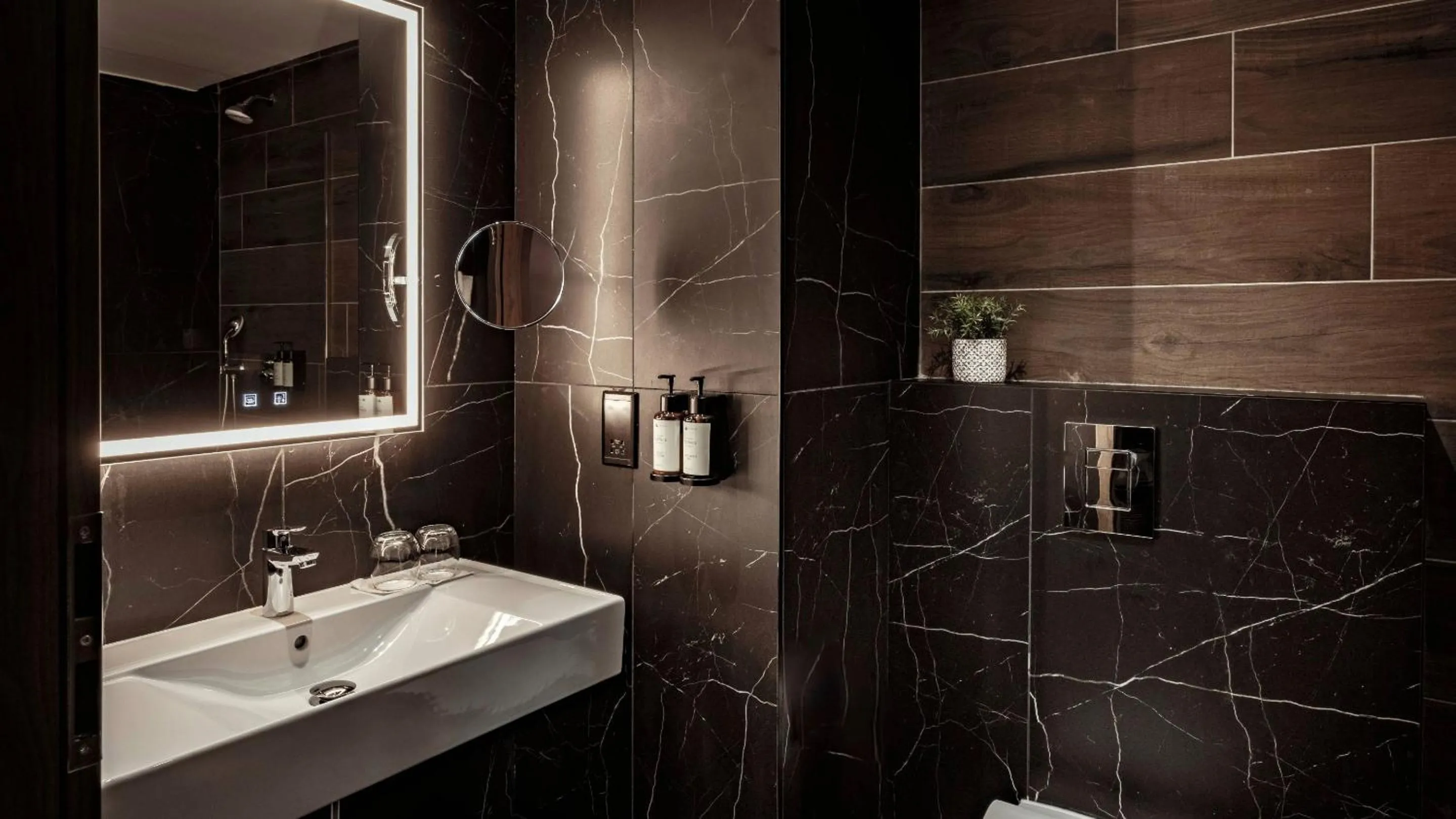 Bathroom in AX ODYCY Hotel