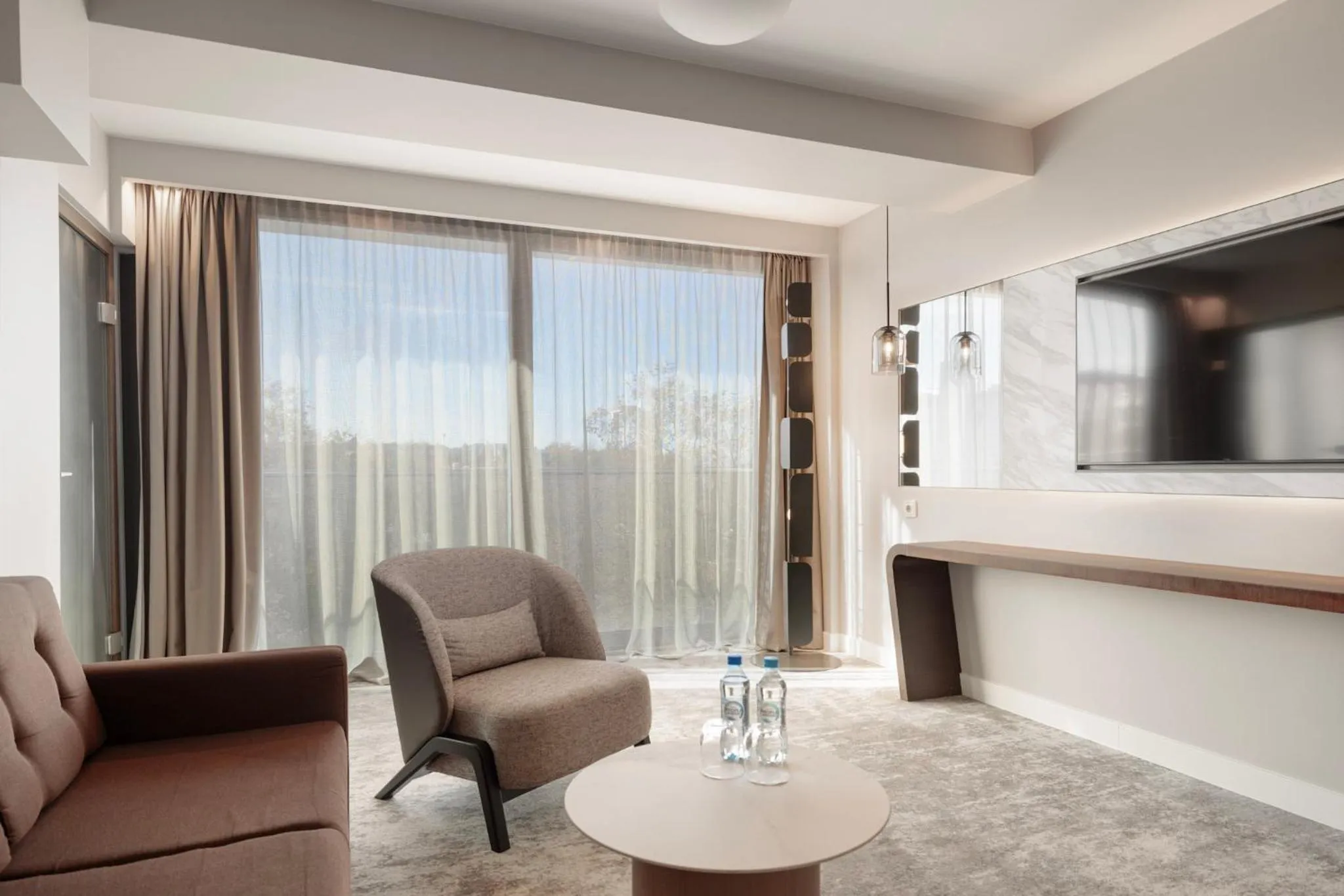 Living room in Marine Hotel by Zdrojowa