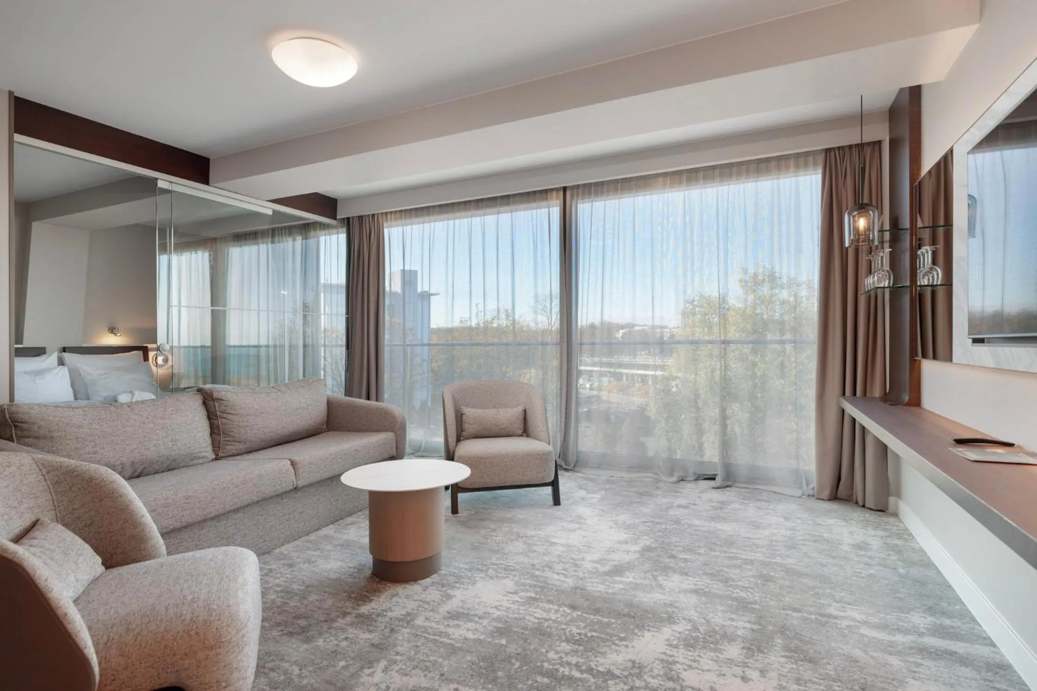 Living room in Marine Hotel by Zdrojowa