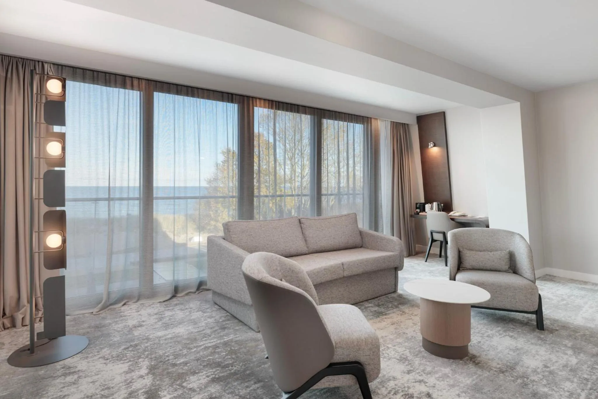 Living room in Marine Hotel by Zdrojowa