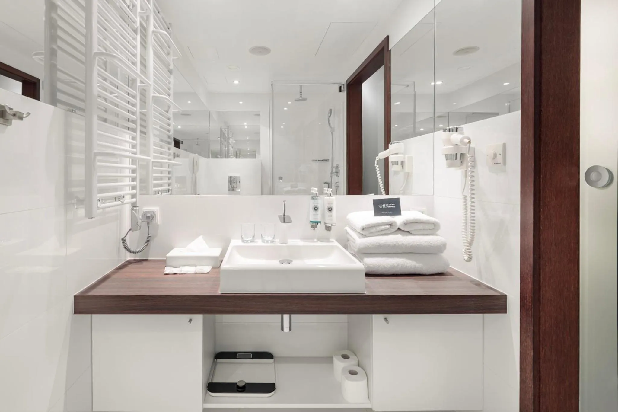 Bathroom in Marine Hotel by Zdrojowa