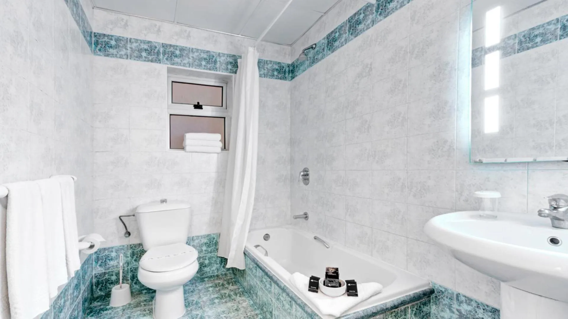 Bathroom in AX Sunny Coast Resort & Spa