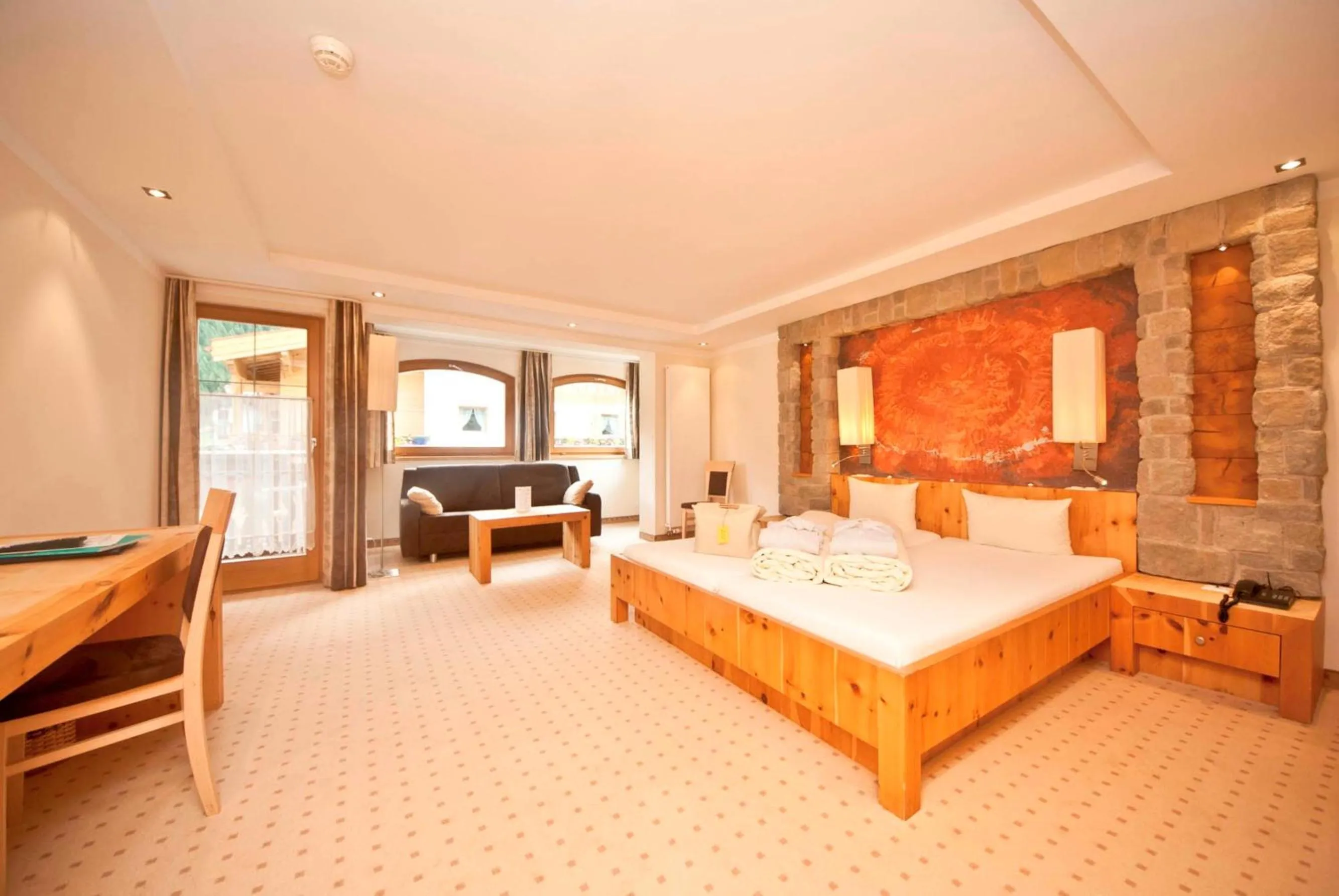 Bed in Hotel des Alpes