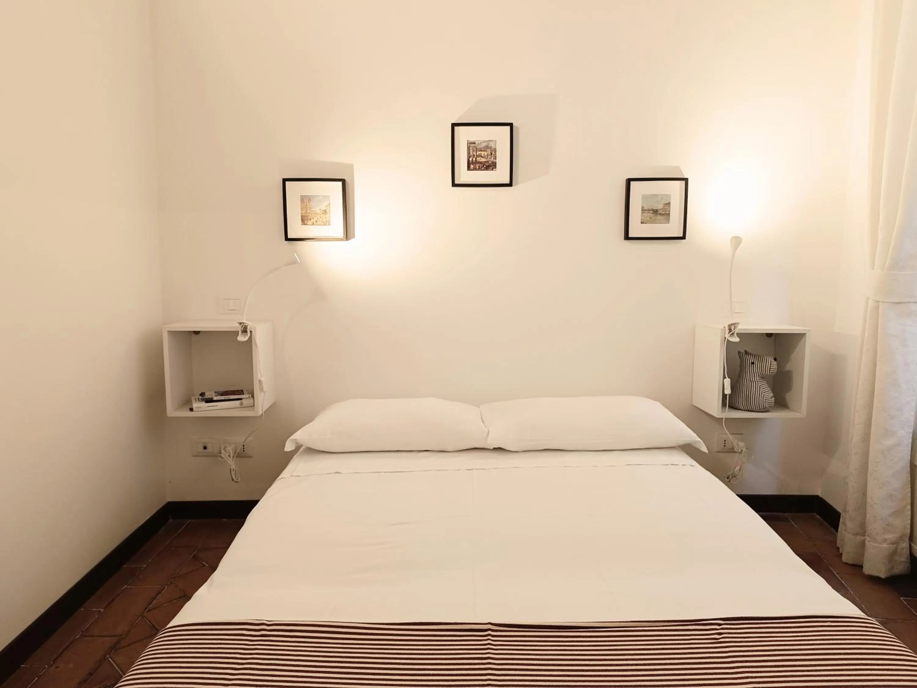 Bed in Piccolo Trevi Suites