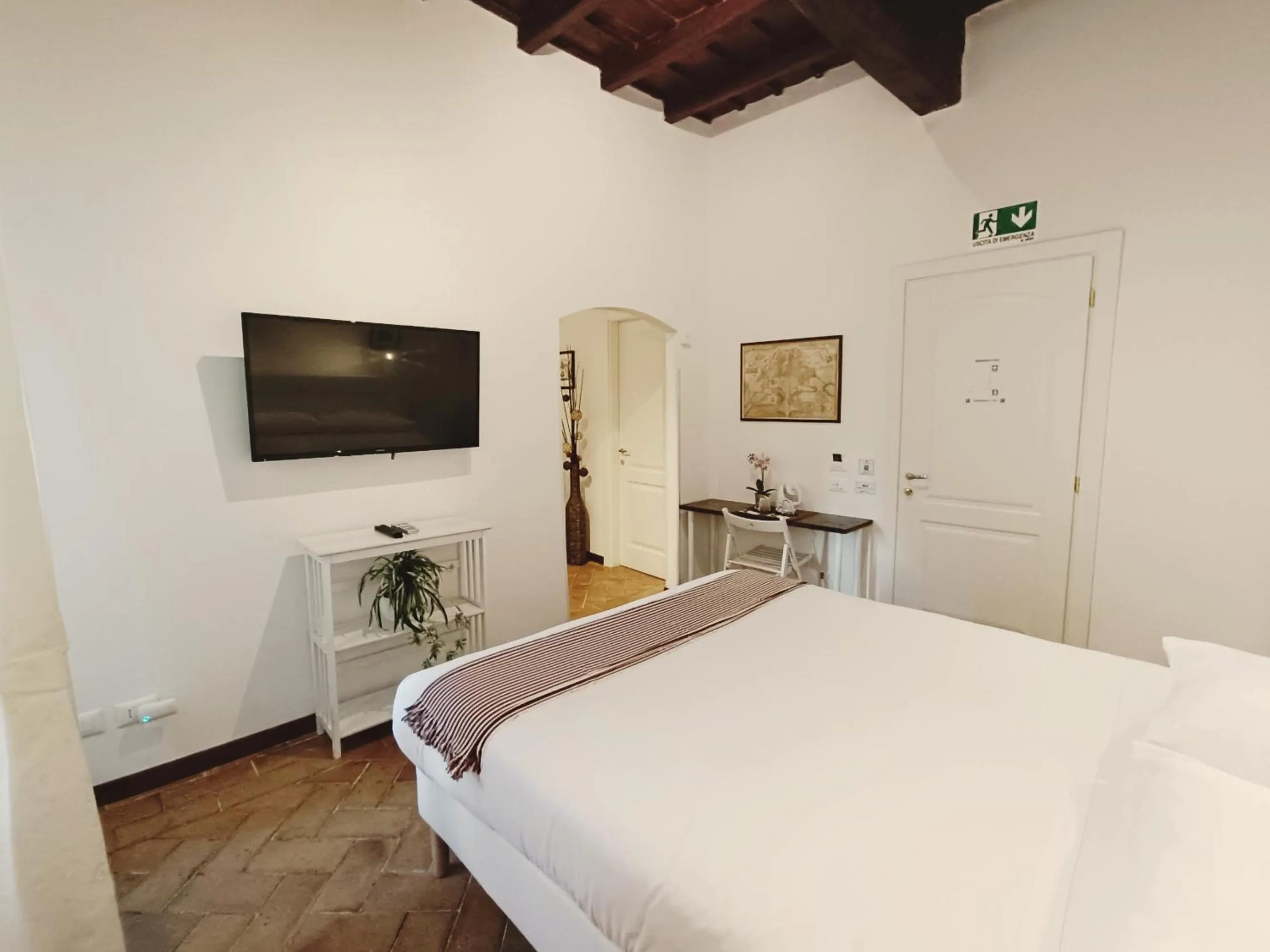 Bed in Piccolo Trevi Suites