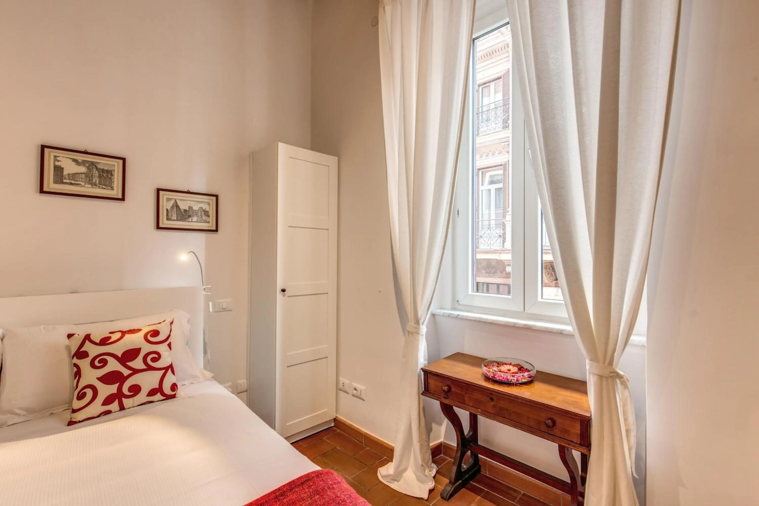 Bed in Piccolo Trevi Suites