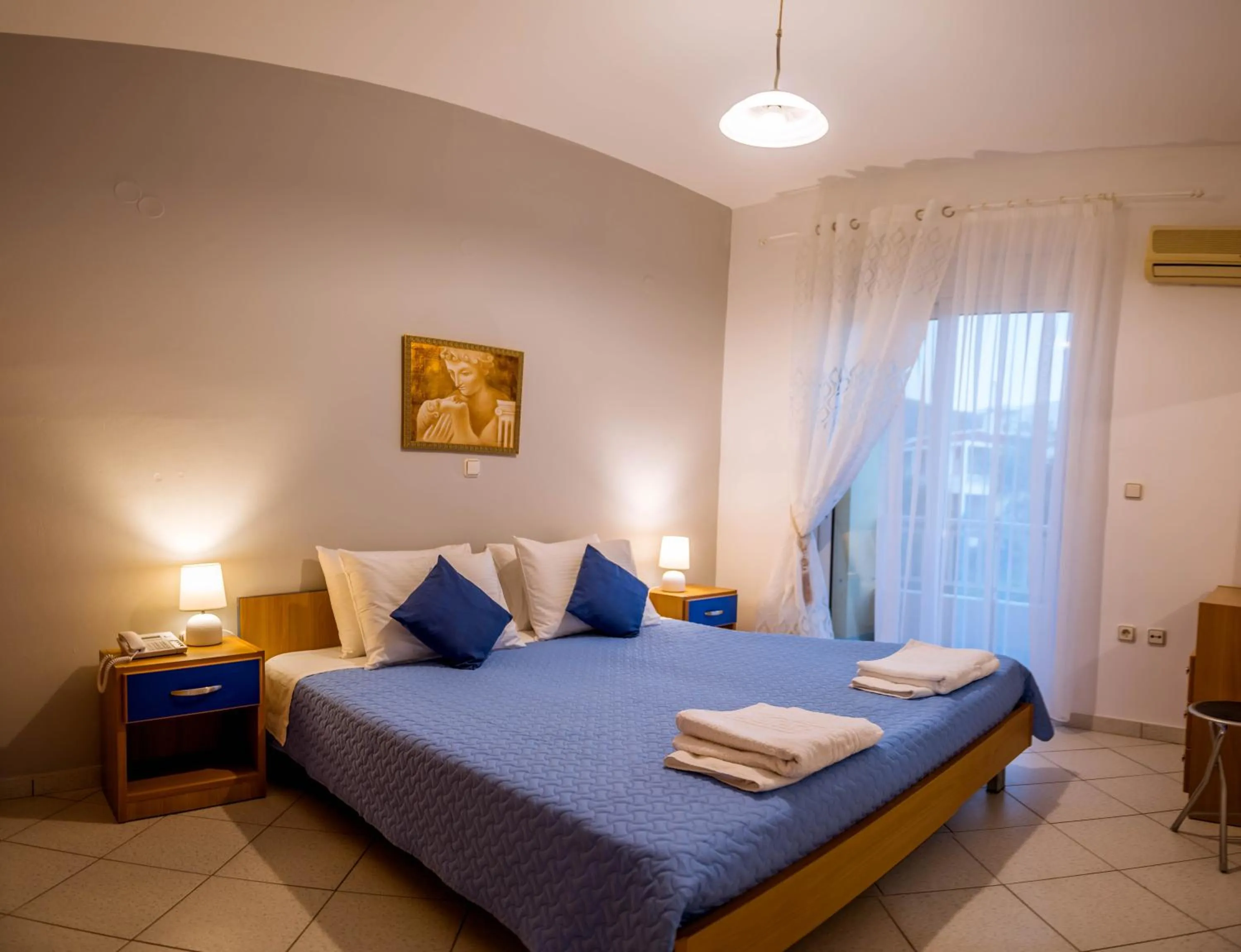 Bedroom, Bed in Pantheon Deluxe Apartments