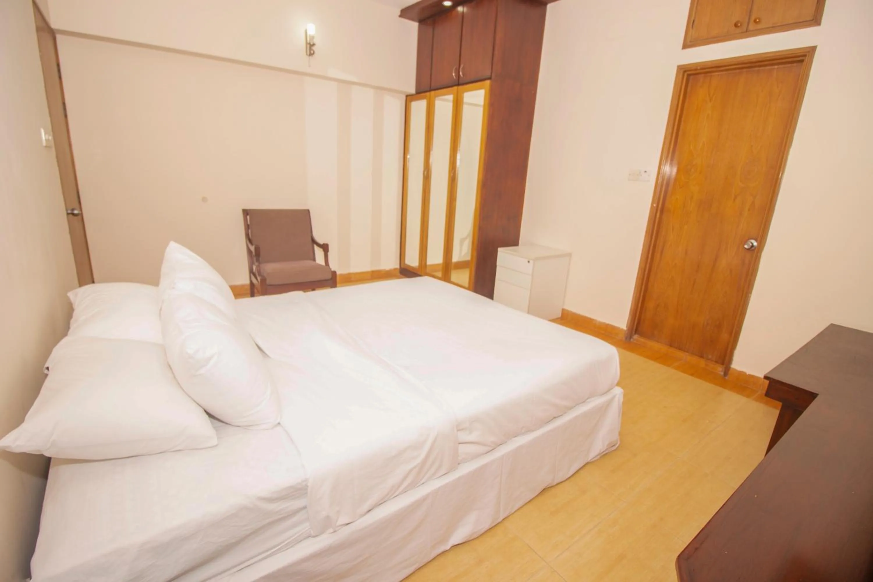Bed in Rafflesia Serviced Apartments