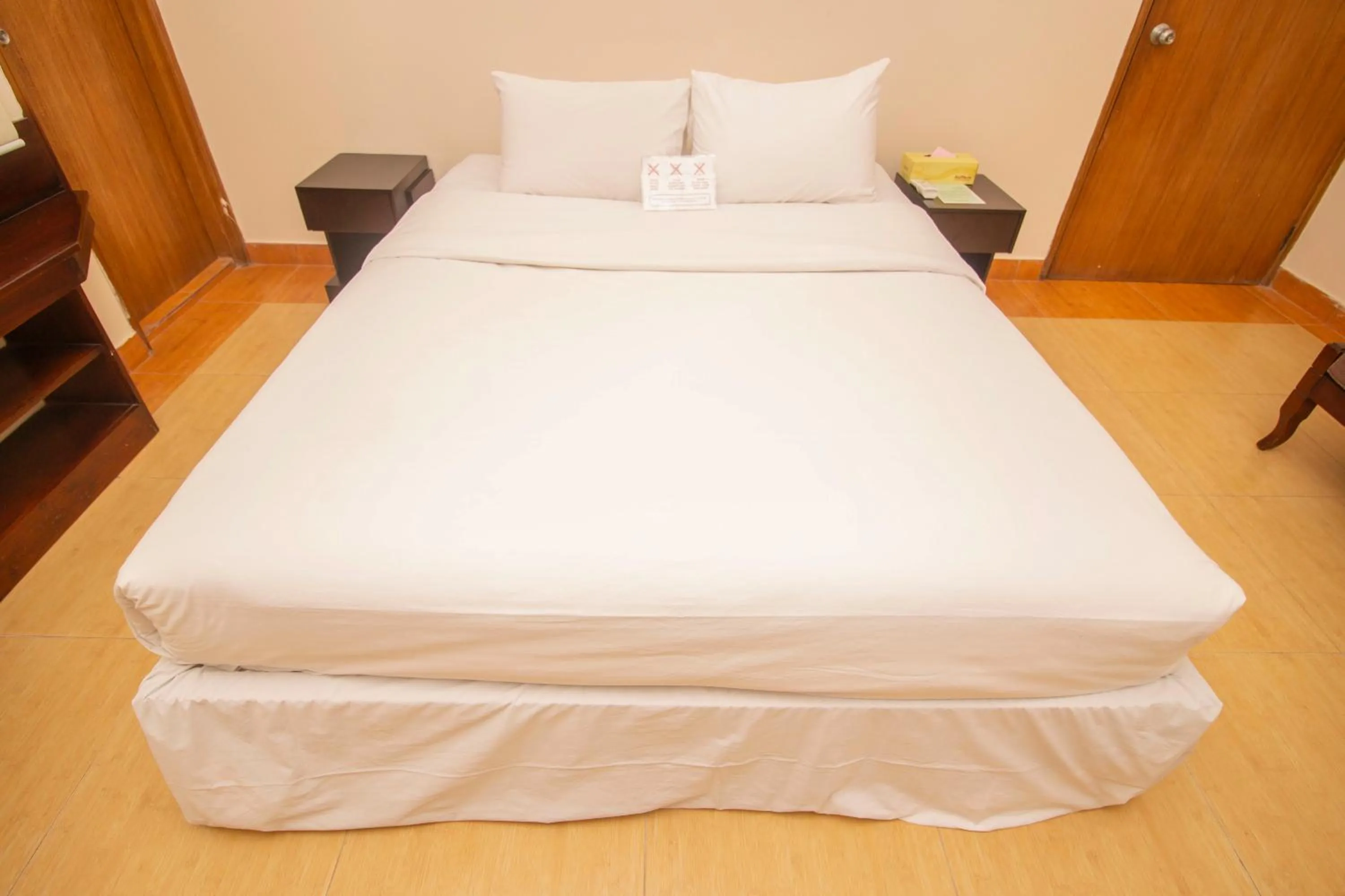 Bed in Rafflesia Serviced Apartments