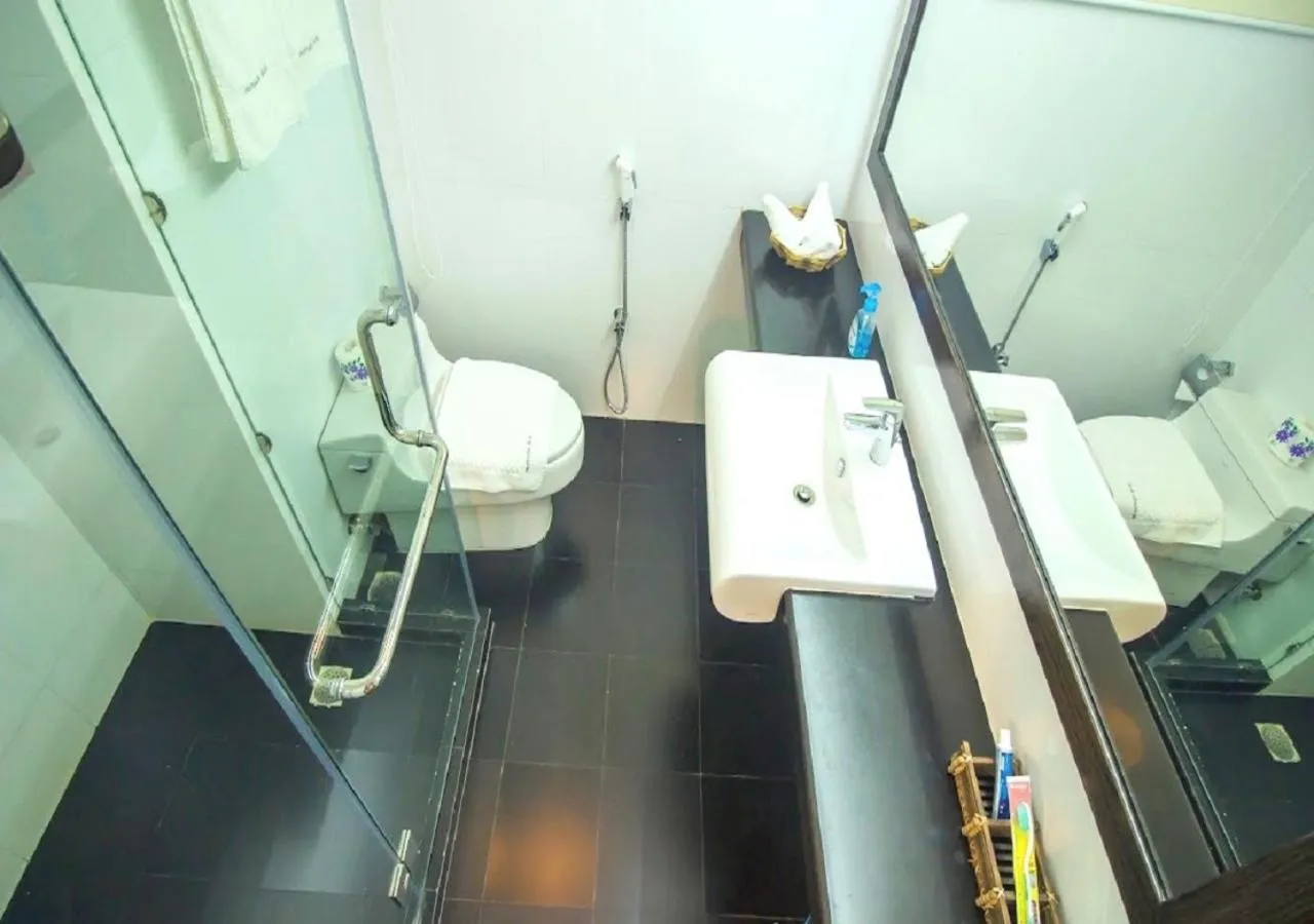 Shower in Rafflesia Serviced Apartments