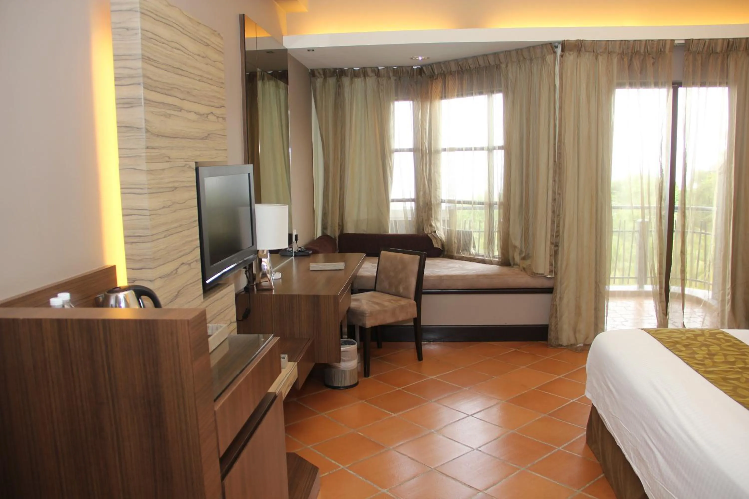 Seating area, Bed in Thistle Port Dickson Resort