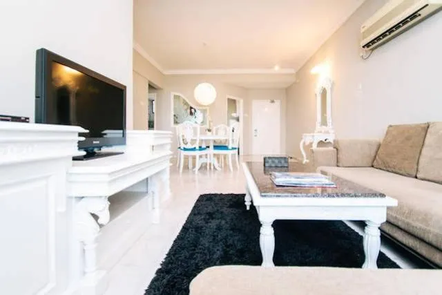 Living room in Century Bay Private Residences