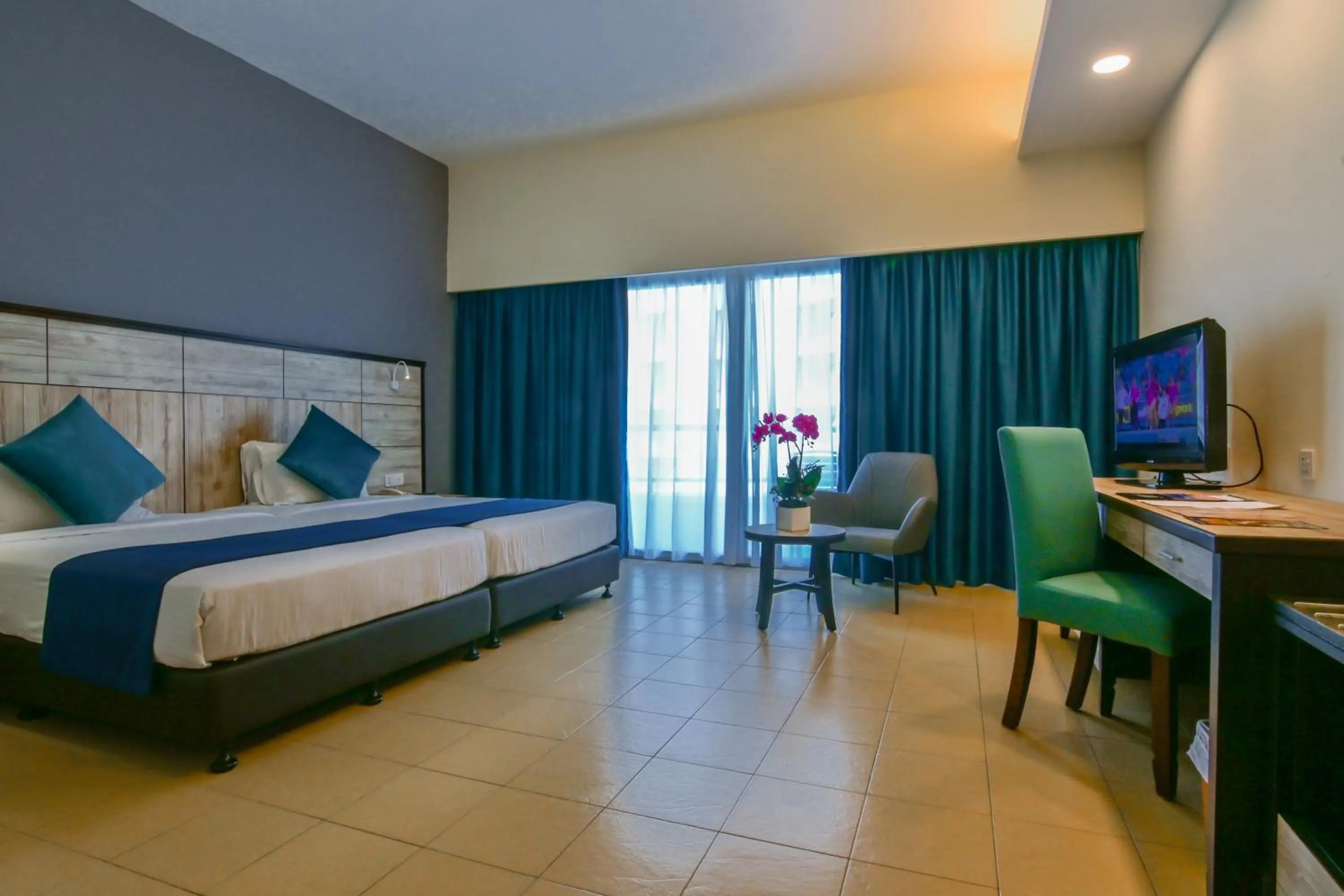 Bed in Flamingo Hotel by the Beach, Penang