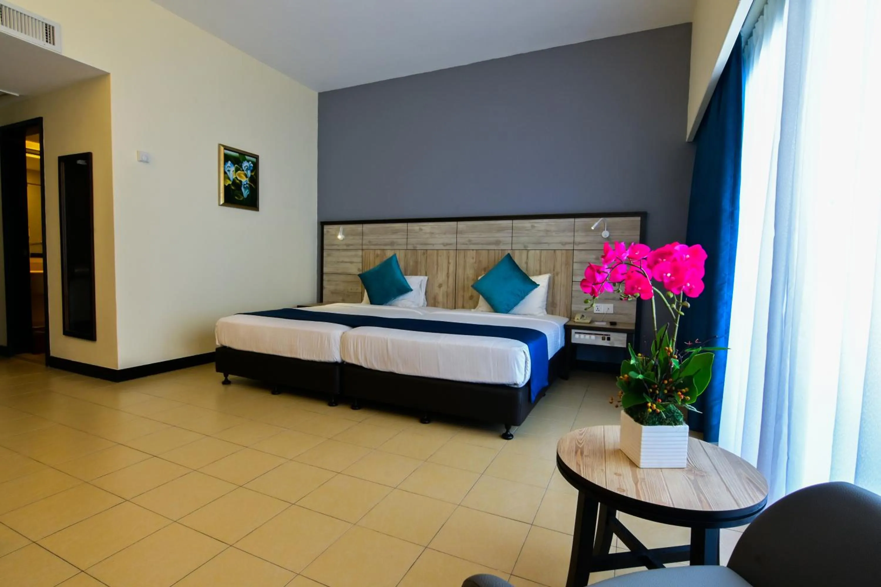 Bed in Flamingo Hotel by the Beach, Penang