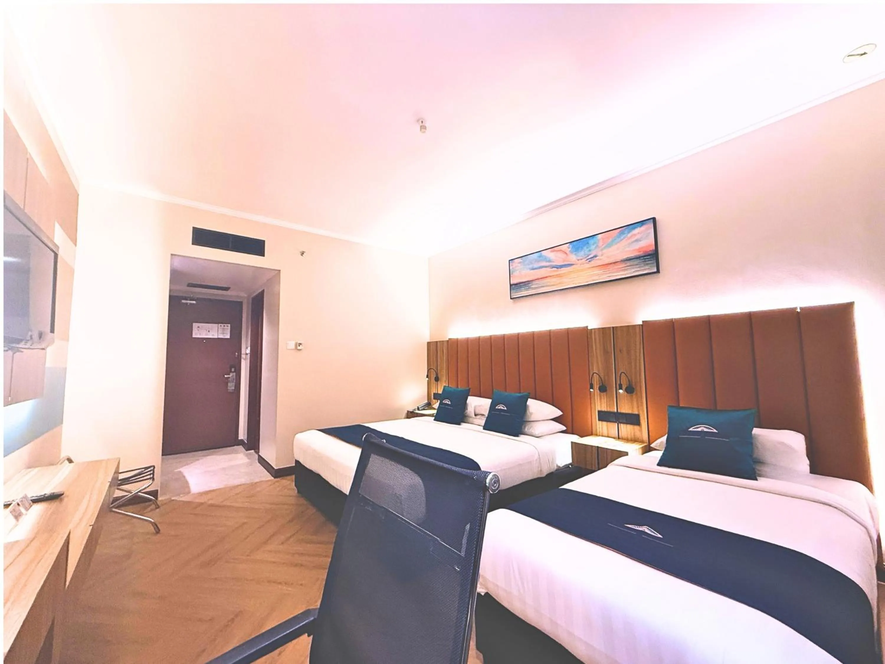 Bed in Howard Johnson by Wyndham Kota Kinabalu City Centre, formerly Hotel Shangri-La Kota Kinabalu