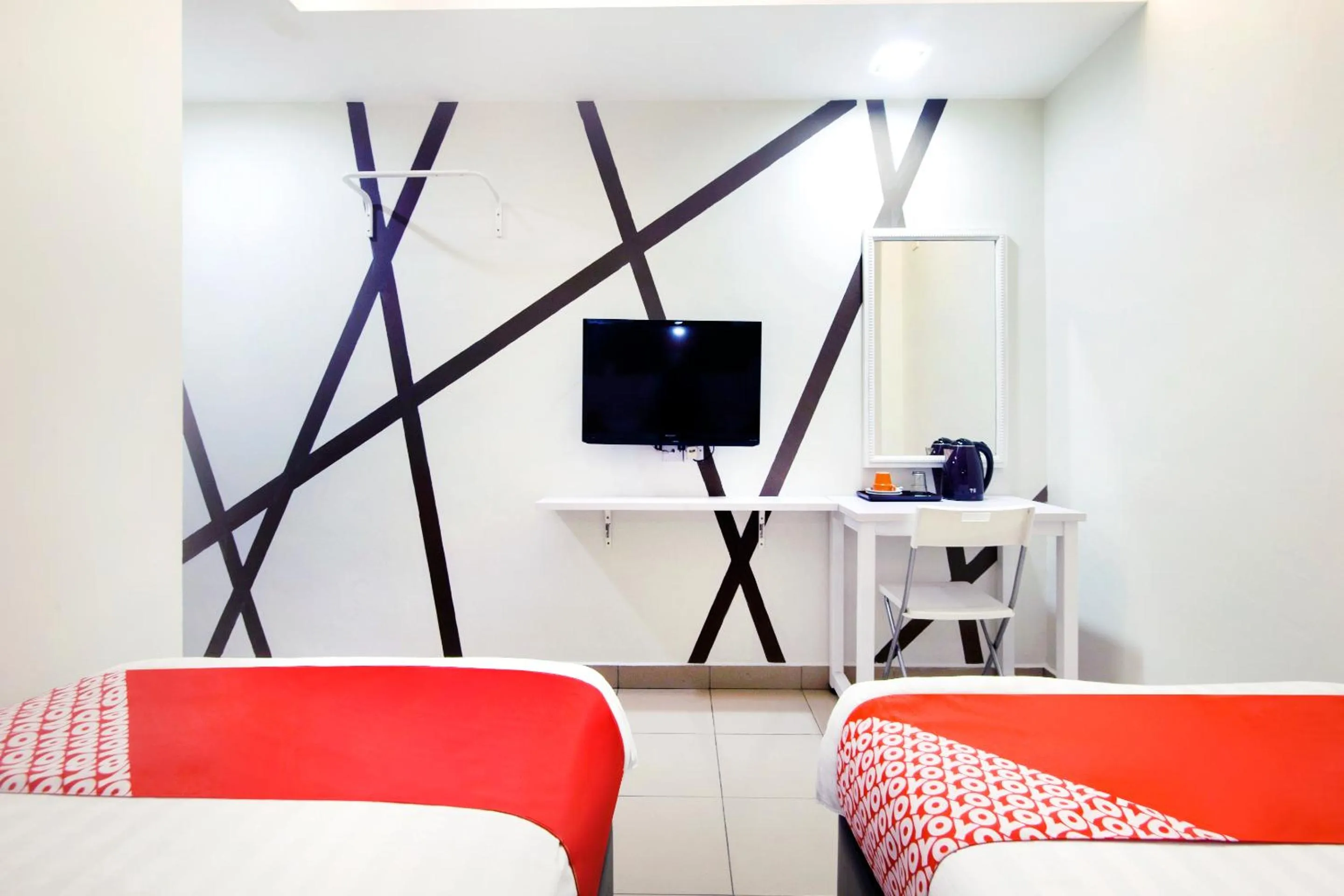 Bed in OYO 761 City Hotel