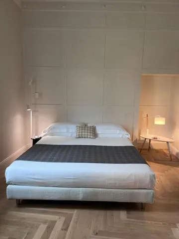 Bed in Porto Sole Rooms