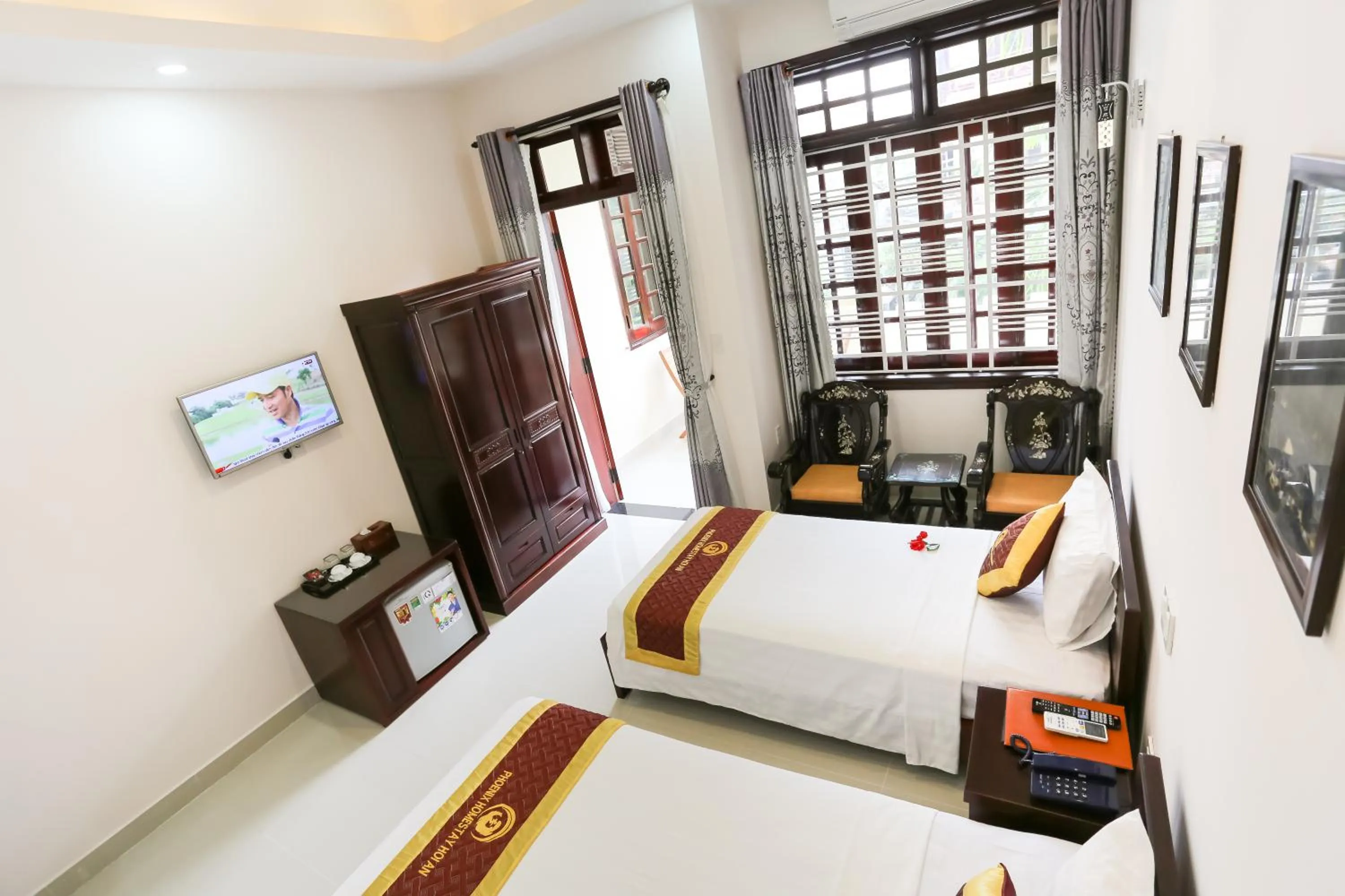 Bedroom, Bed in Phoenix Homestay